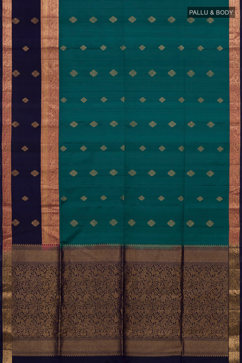 Flat view of Teal Soft Silk Saree with Zari Butta on the body and Fancy Border. 