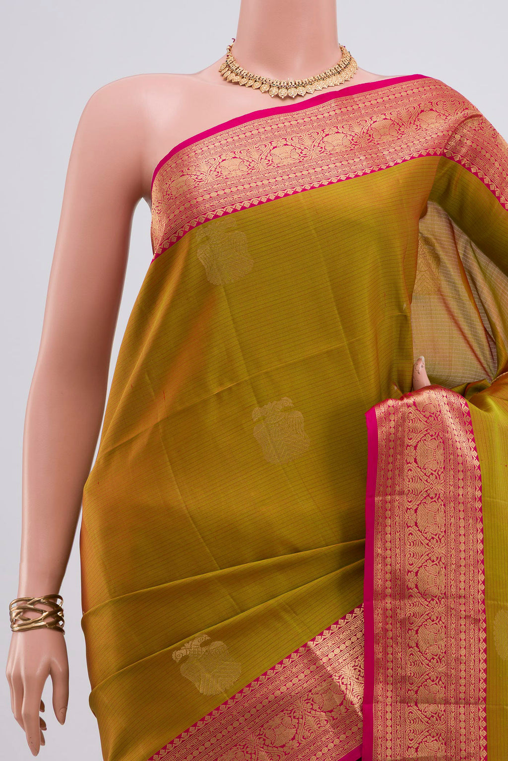 Border image of Green Soft Silk Saree with Zari Butta on the body and Zari Border. 