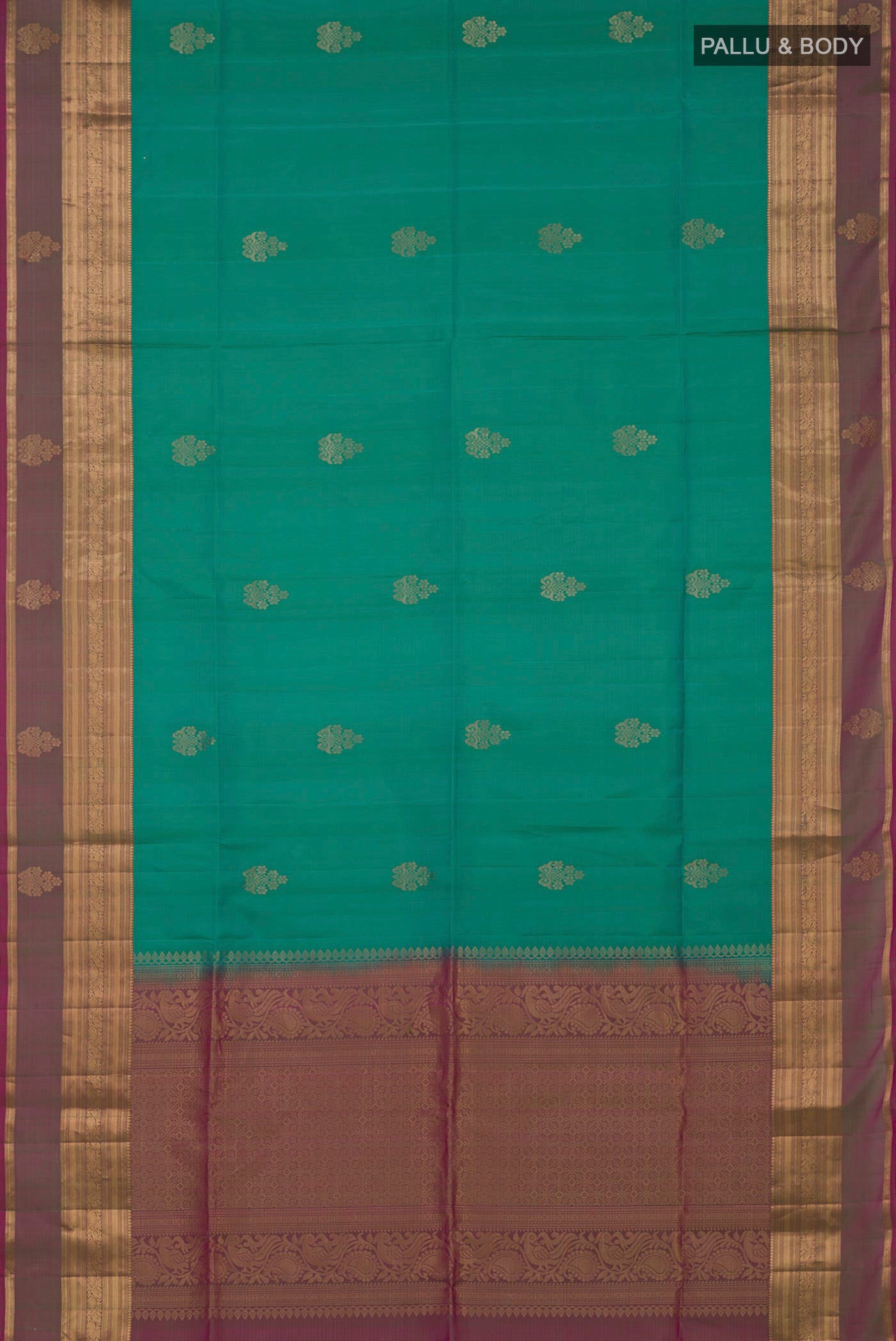 Flat view of Turquoise Soft Silk Saree with Zari Butta on the body and Zari Border. 