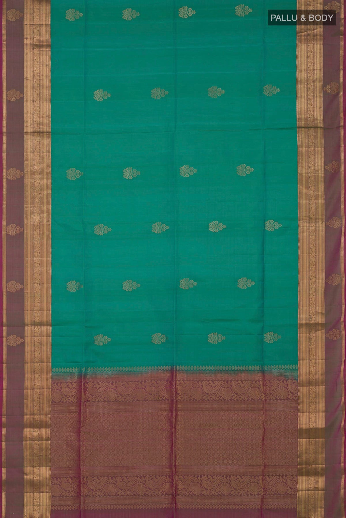 Flat view of Turquoise Soft Silk Saree with Zari Butta on the body and Zari Border. 