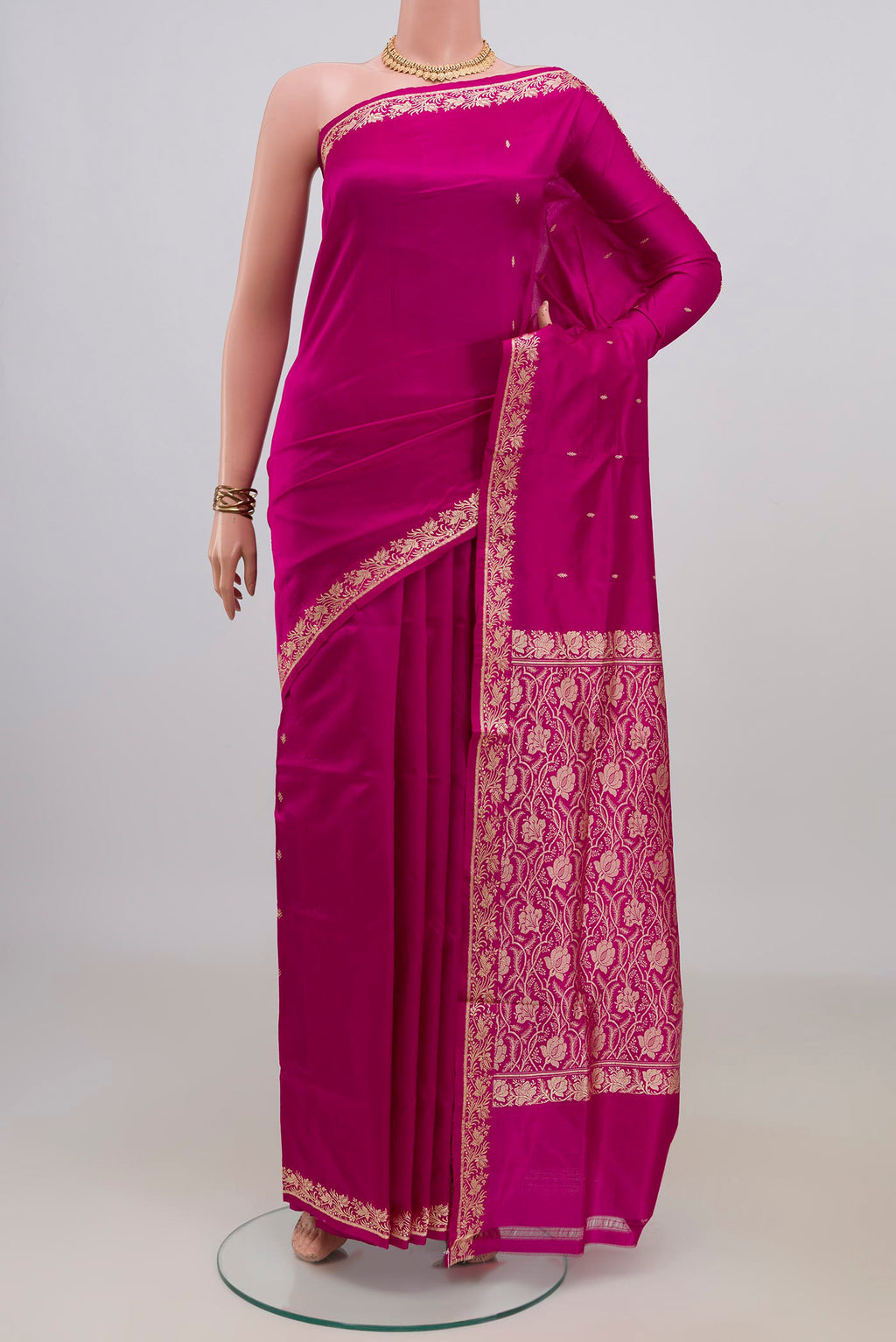 Pure Silk Pink Banarasi Katan Saree with Thread Butta on the body and Thread Border.  displayed on a mannequin