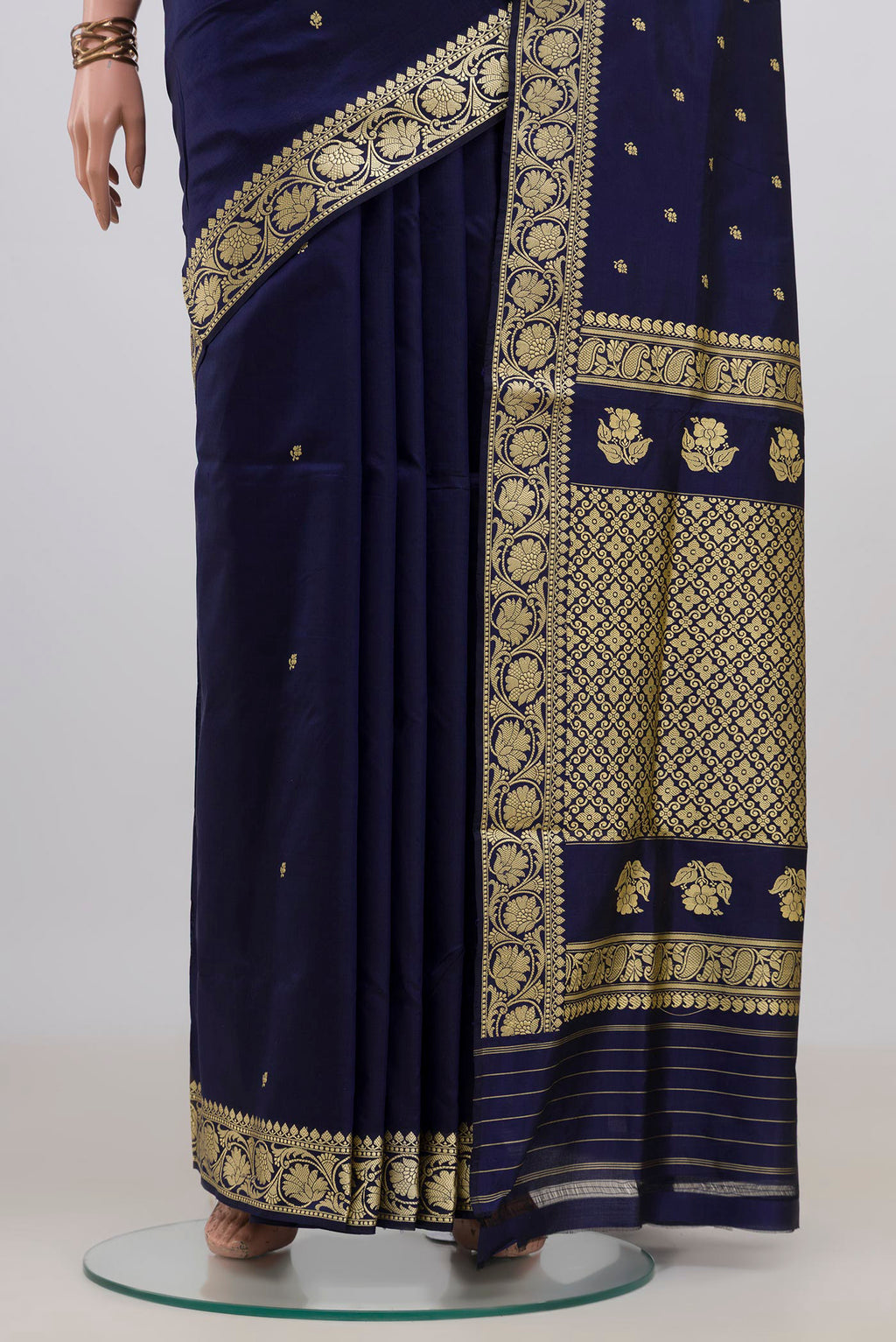 Pleats and pallu of Pure Silk Navy Blue Banarasi Katan Saree with Thread Butta on the body and Thread Border. 