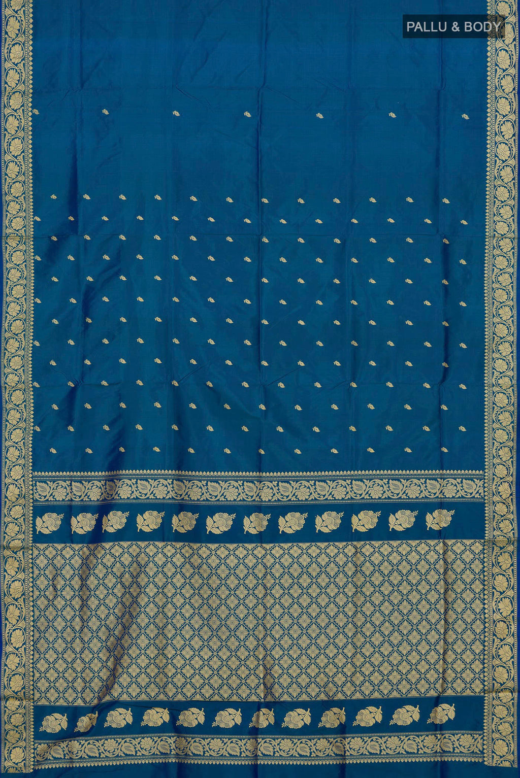 Flat view of Pure Silk Blue Banarasi Katan Saree with Thread Butta on the body and Thread Border. 