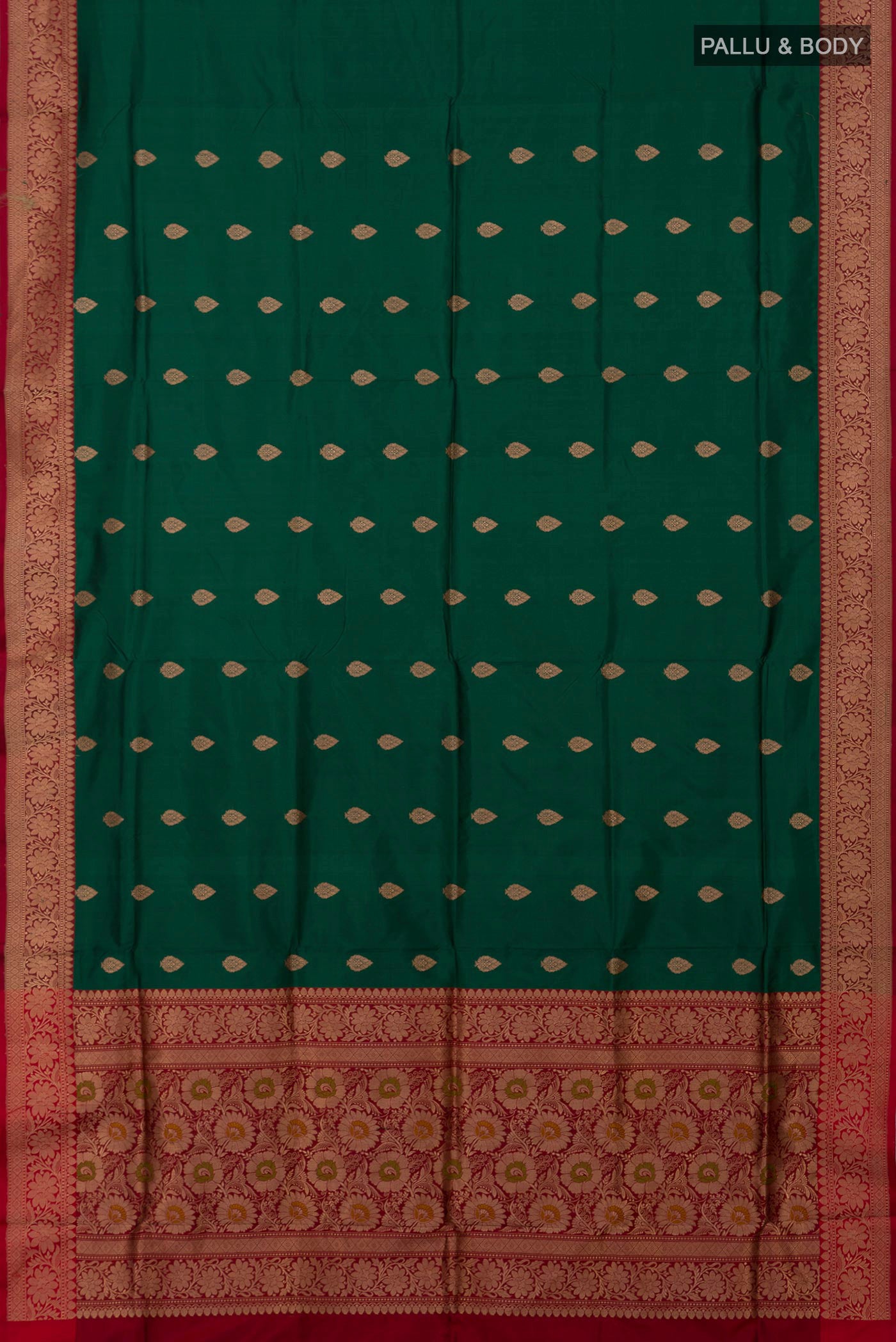 Flat view of Bottle Green Banarasi Katan Silk Saree with Zari Butta on the body and Fancy Border. 