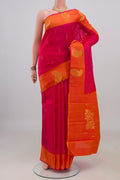 Pure Silk Pink Kanchipuram Saree with Zari Butta on the body and Fancy Border.  displayed on a mannequin