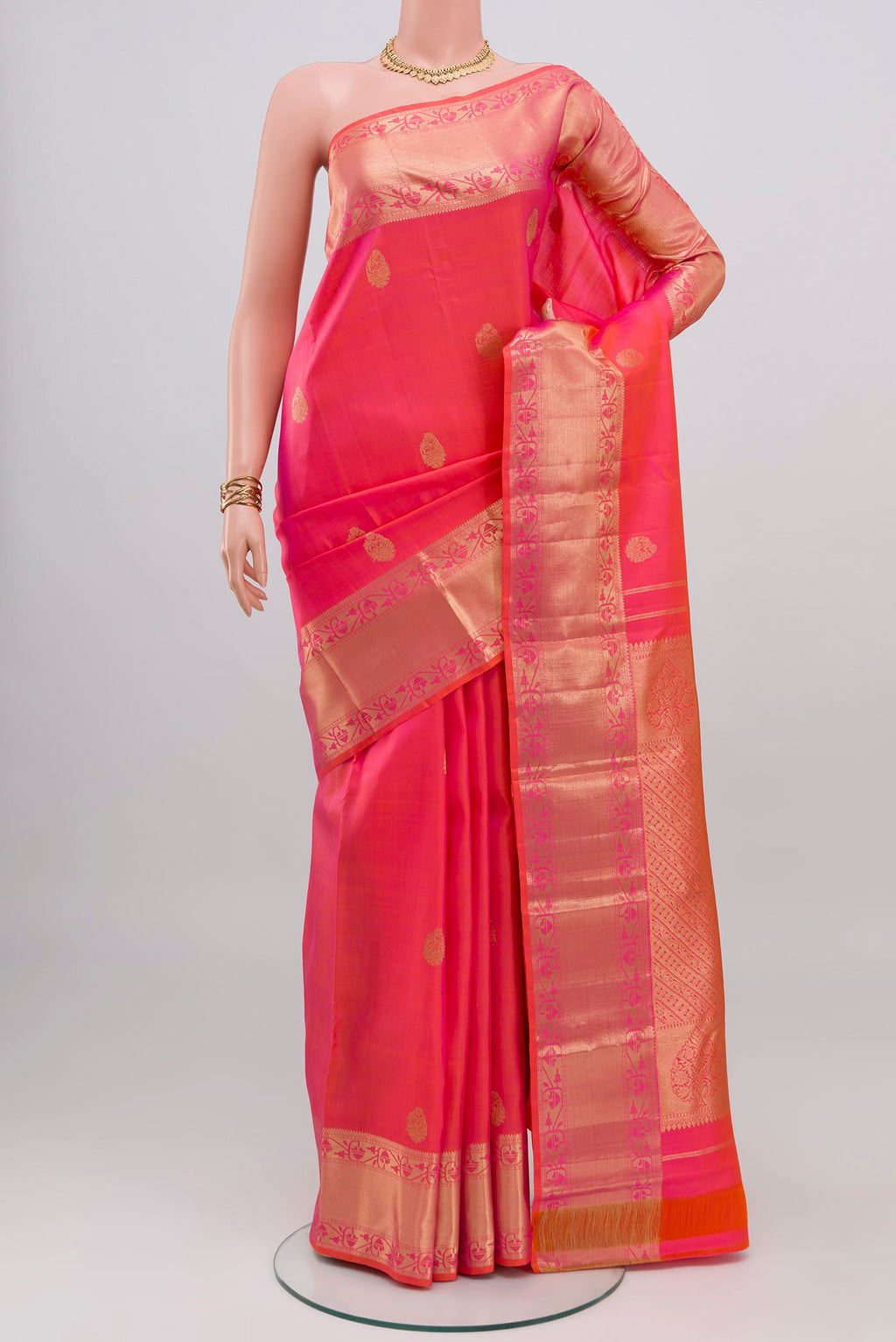 Pink Dual Tone Kanchipuram Silk Saree with Zari Butta on the body and Zari Border.  displayed on a mannequin