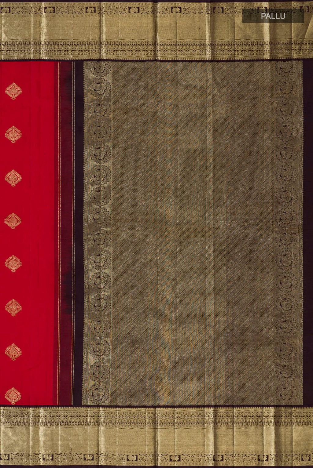 Close up image of the pallu of Red Kanjivaram Silk Saree with Zari Butta on the body and Zari Border. 