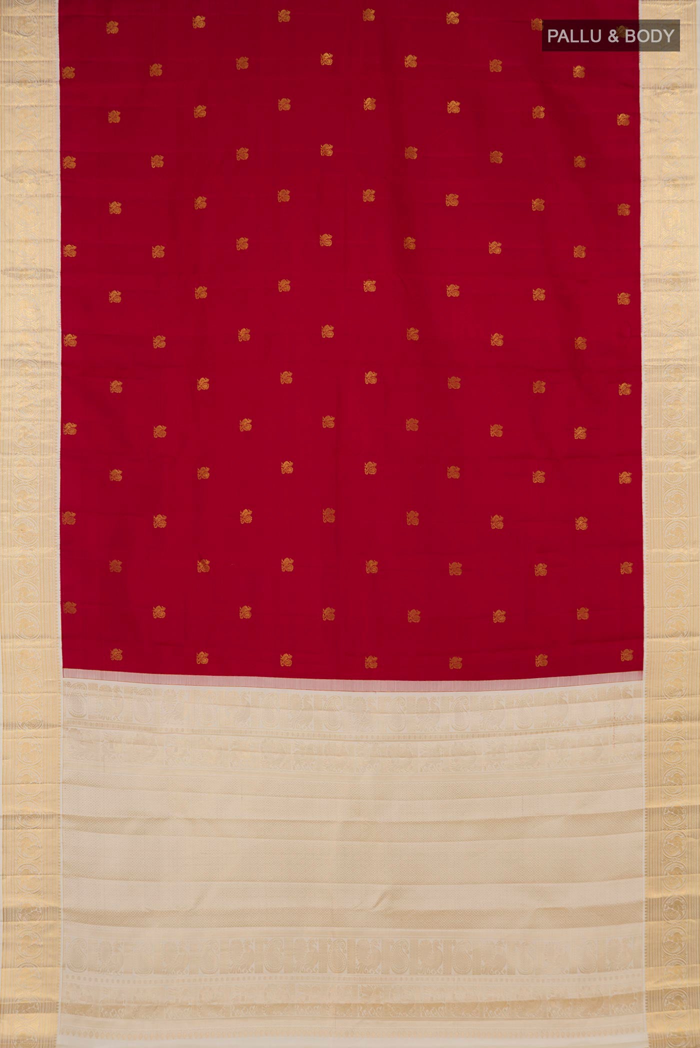 Flat view of Maroon Kanjivaram Silk Saree with Zari Butta on the body and Zari Border. 