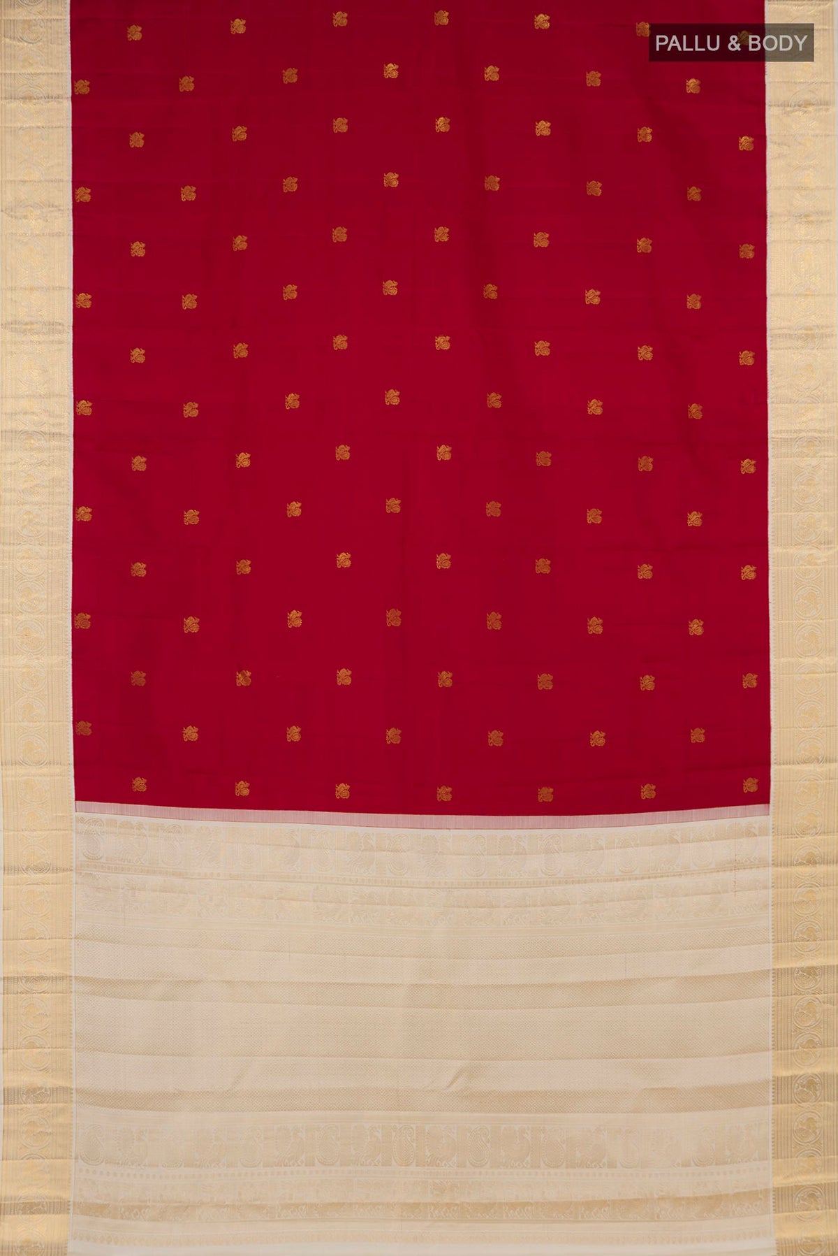 Flat view of Maroon Kanjivaram Silk Saree with Zari Butta on the body and Zari Border. 