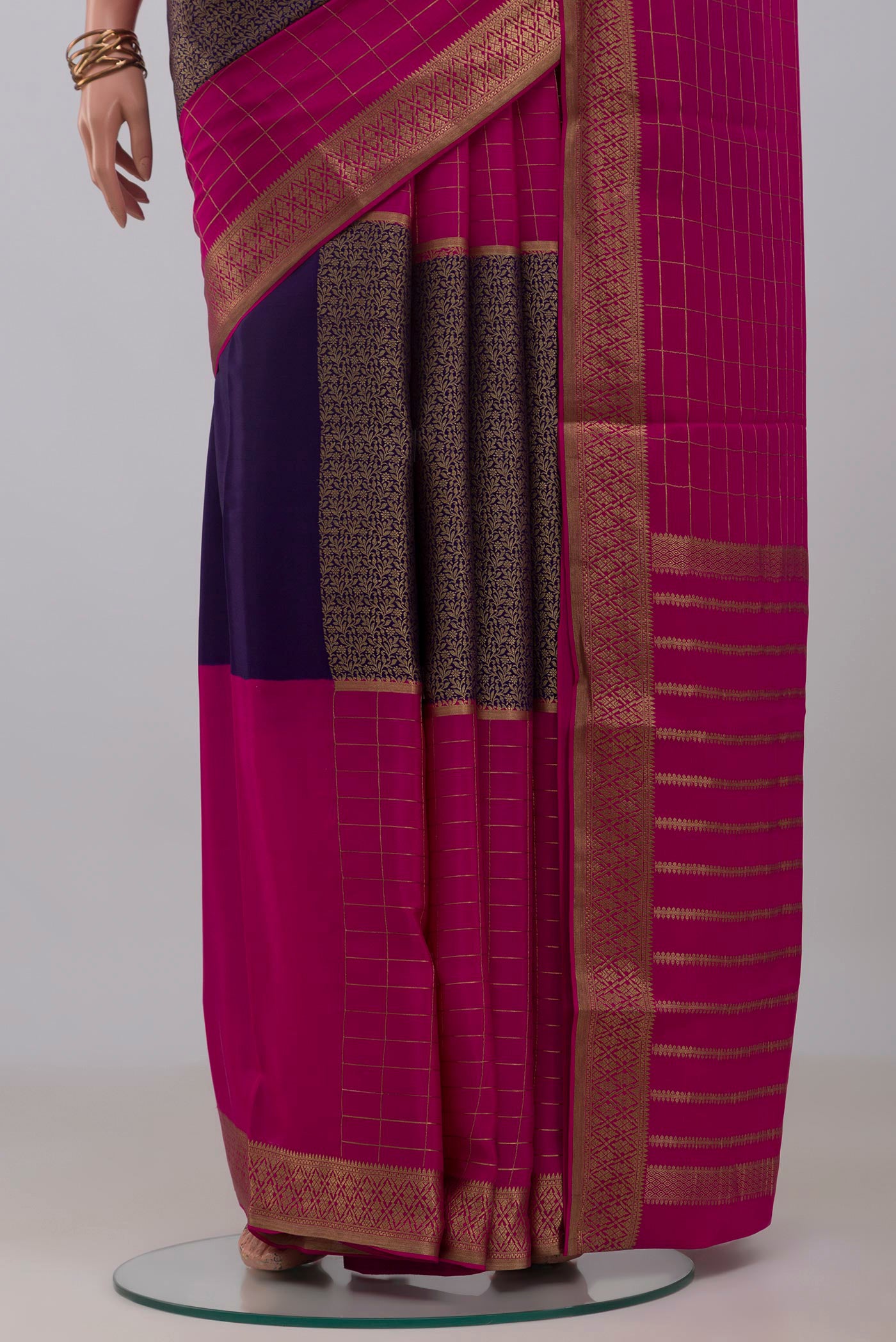 Pleats and pallu of Multi Color Mysore Crepe Saree with Checked design on the body and Zari Border. 