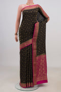 Black Mysore Crepe Saree with Zari Brocade on the body and Zari Border.  displayed on a mannequin