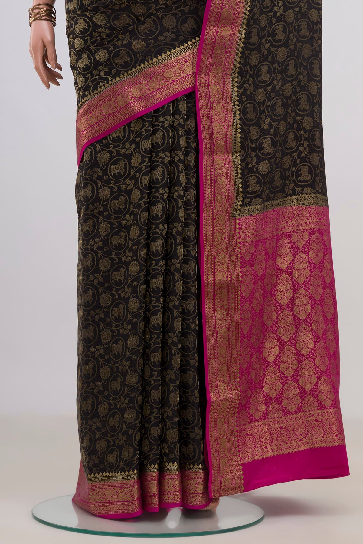 Pleats and pallu of Black Mysore Crepe Saree with Zari Brocade on the body and Zari Border. 