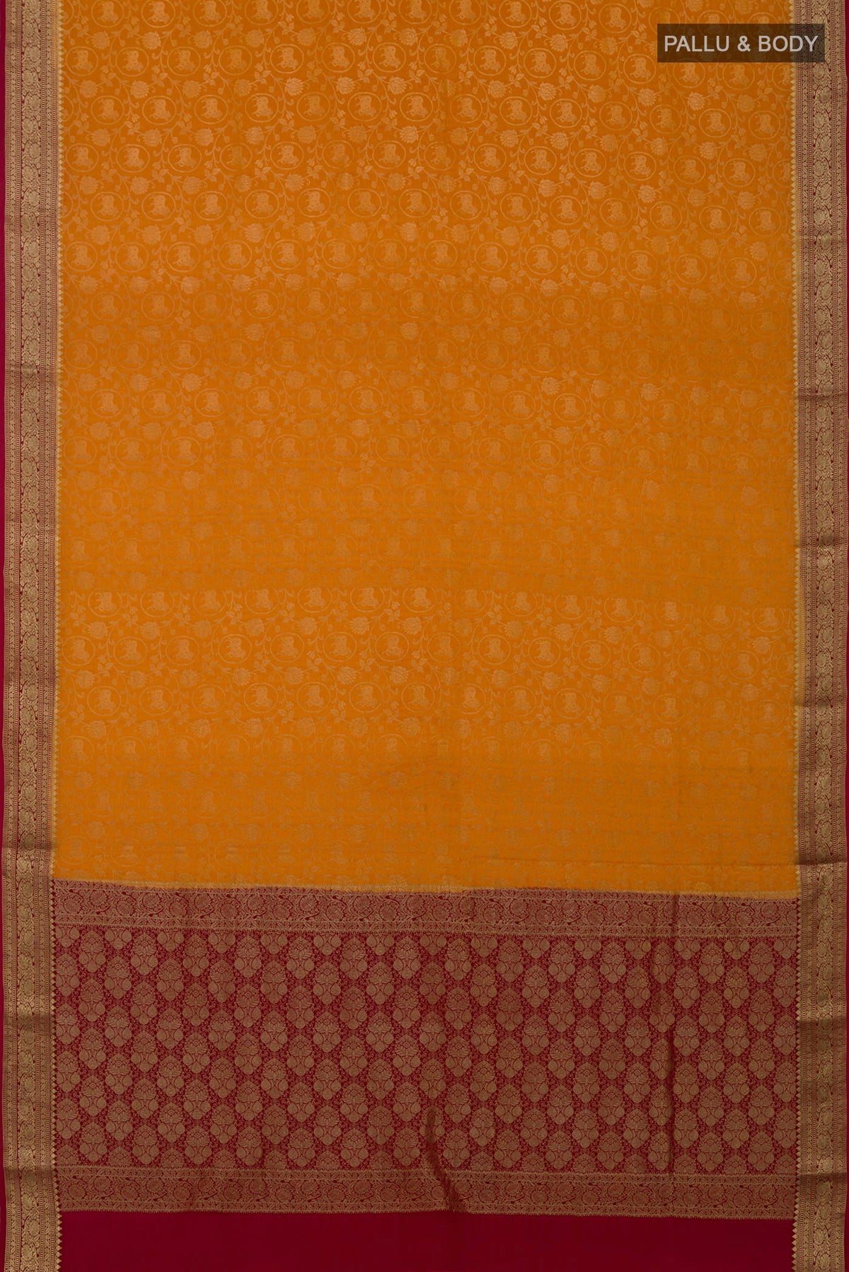 Flat view of Mustard Mysore Crepe Saree with Zari Brocade on the body and Zari Border. 