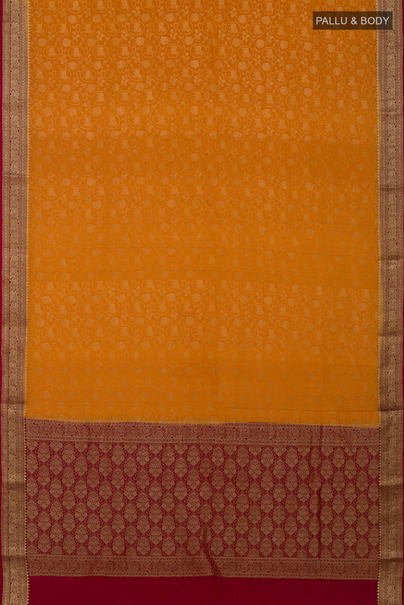 Flat view of Mustard Mysore Crepe Saree with Zari Brocade on the body and Zari Border. 
