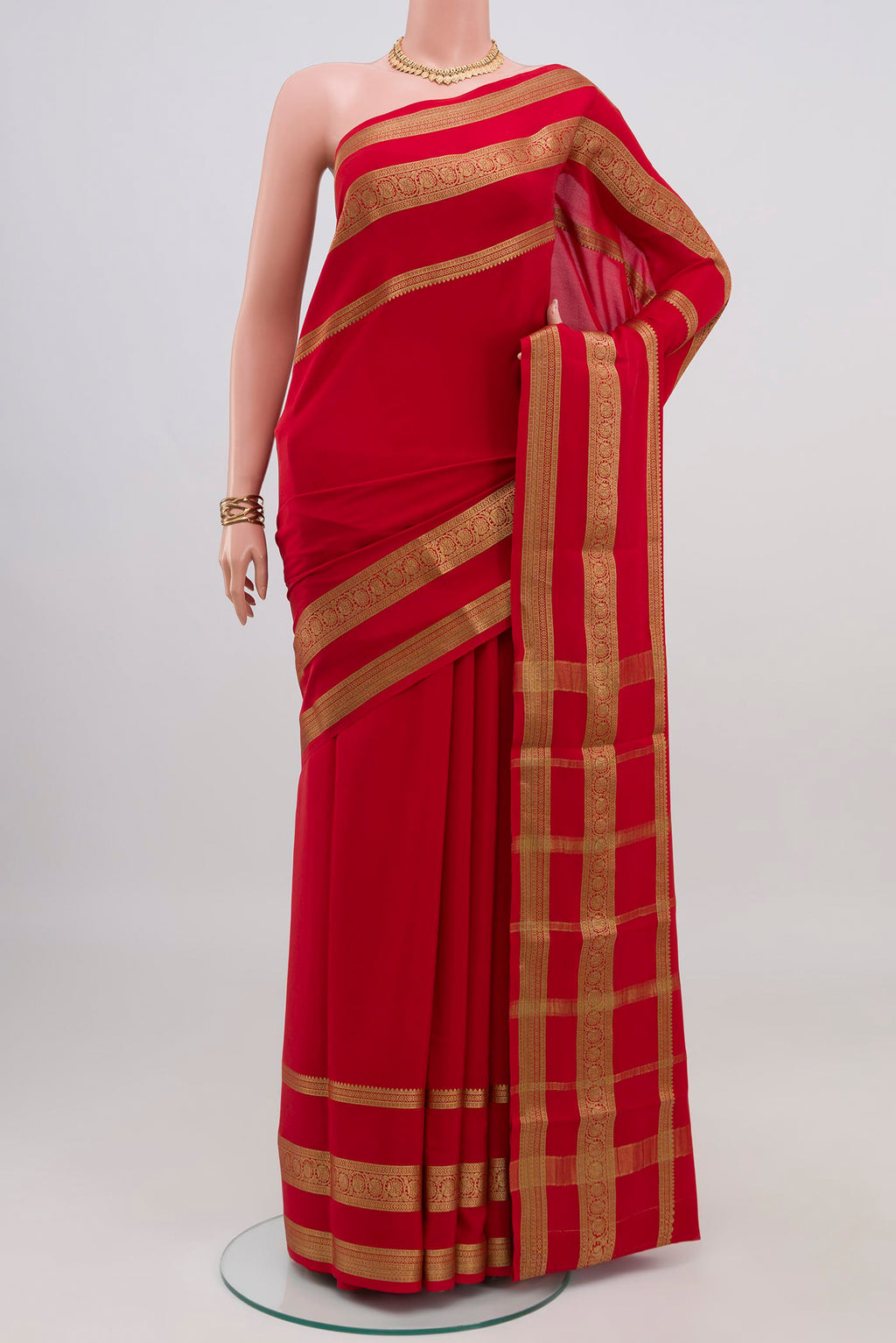 Red Mysore Crepe Saree with Plain Body and Zari Border.  displayed on a mannequin