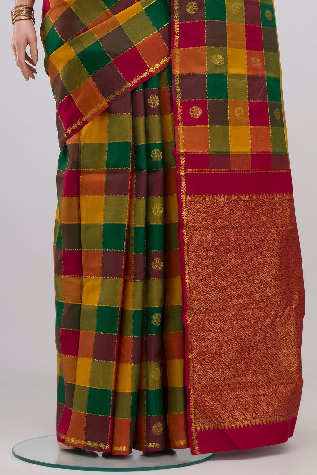 Pleats and pallu of Multi Color Kanchipuram Silk Saree with Checked design on the body and Thin Zari Line. 