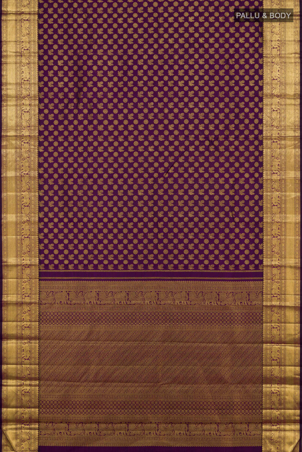 Flat view of Purple Kanchipuram Silk Saree with Zari Brocade on the body and Zari Border. 