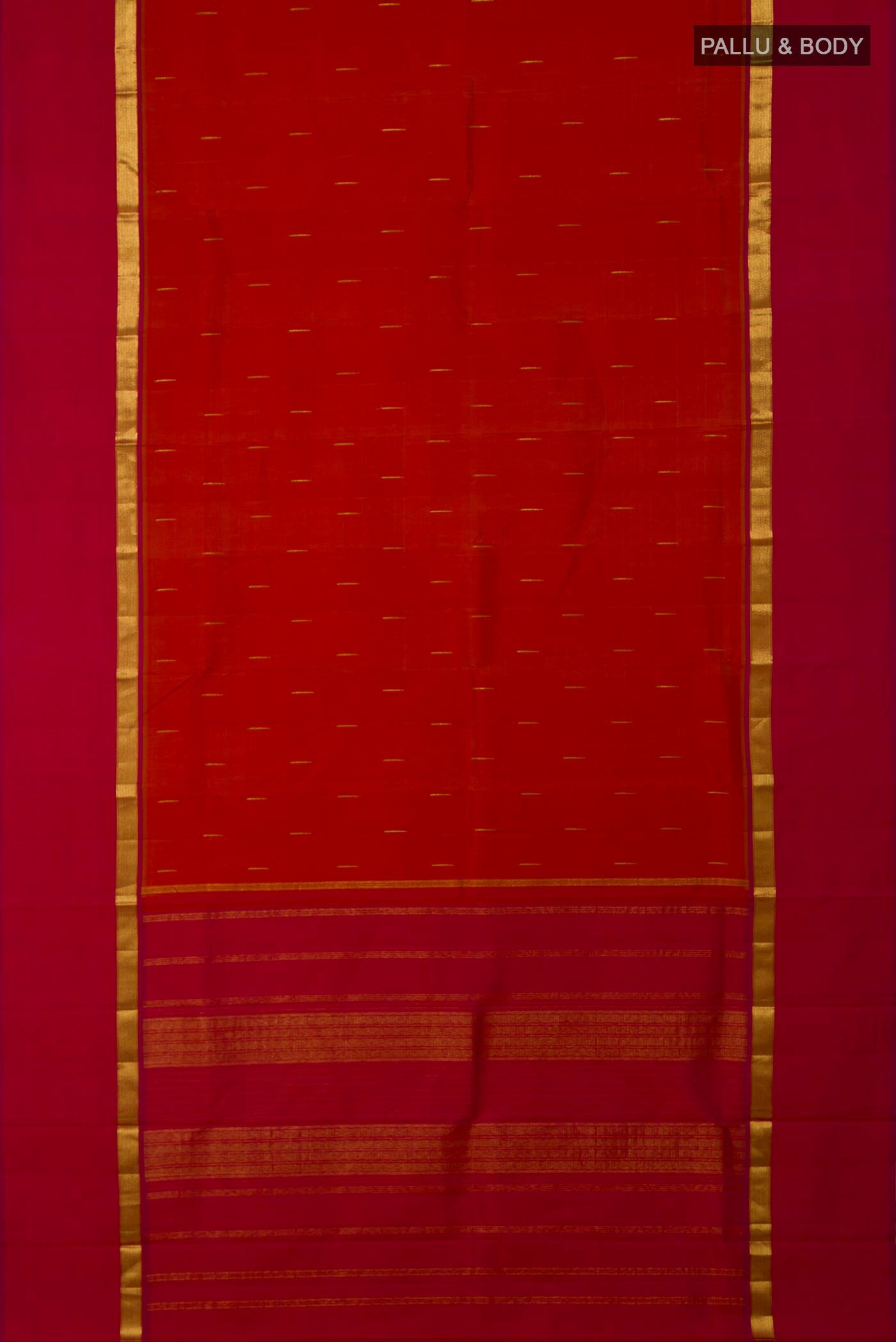 Flat view of Brick Orange Kanjivaram Silk Saree with Zari Butta on the body and Zari Border. 