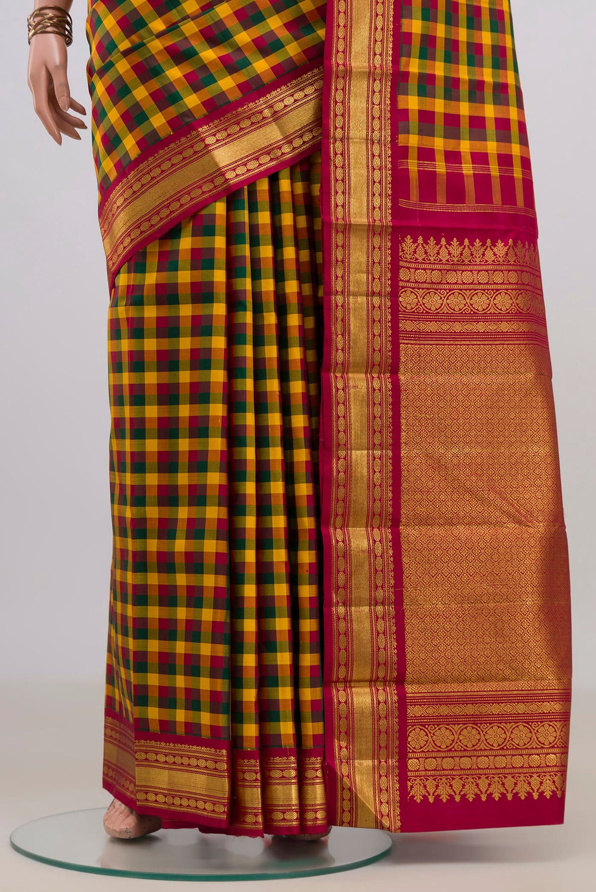 Pleats and pallu of Pure Silk Multi Color Kanchipuram Saree with Checked design on the body and Zari Border. 