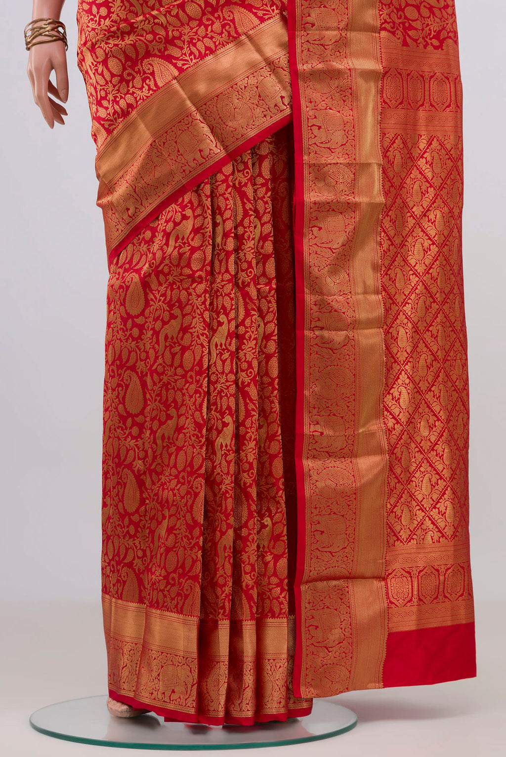 Pleats and pallu of Red Kanjivaram Silk Saree with Zari Brocade on the body and Zari Border. 