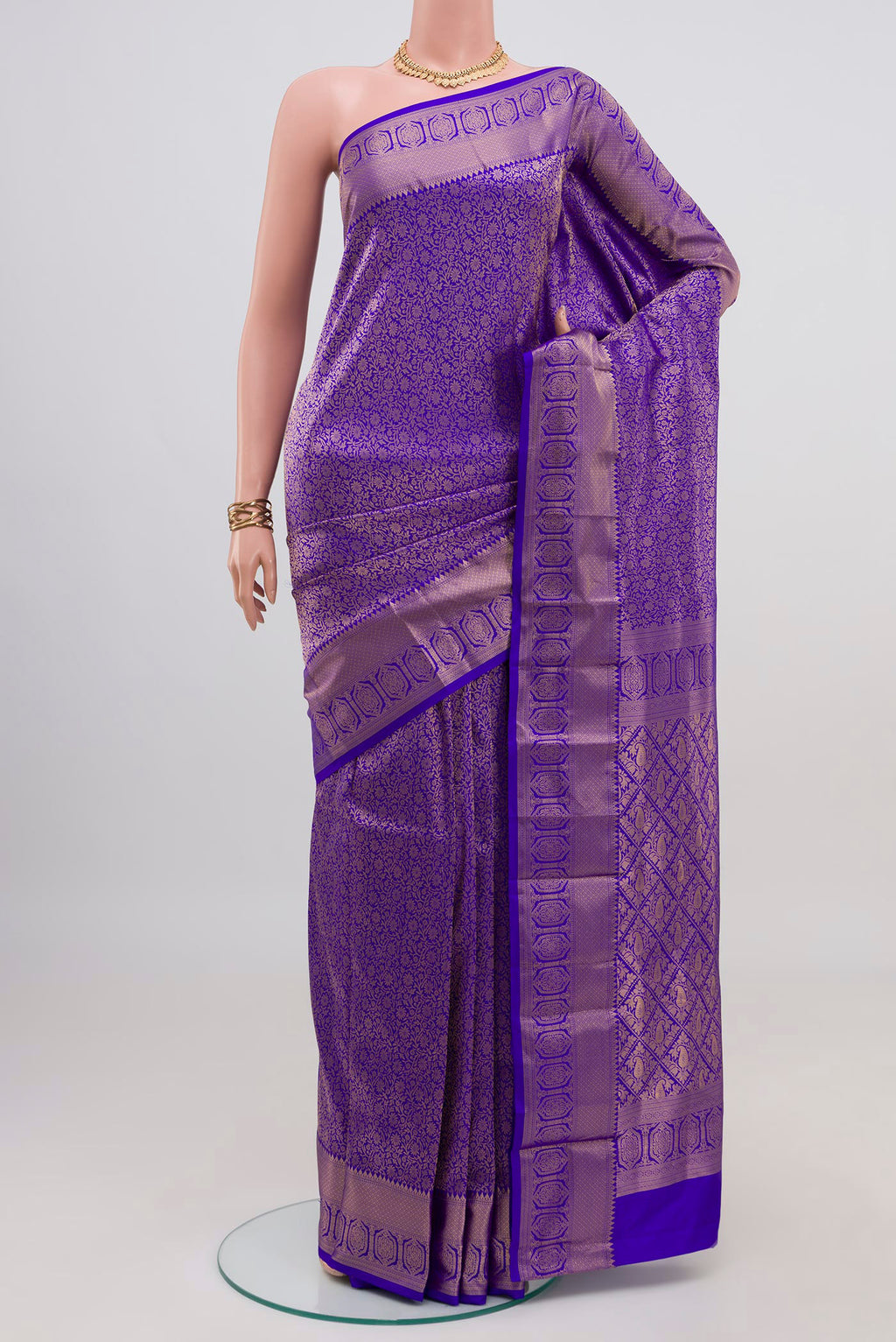 Blue Kanjivaram Silk Saree with Zari Brocade on the body and Zari Border.  displayed on a mannequin