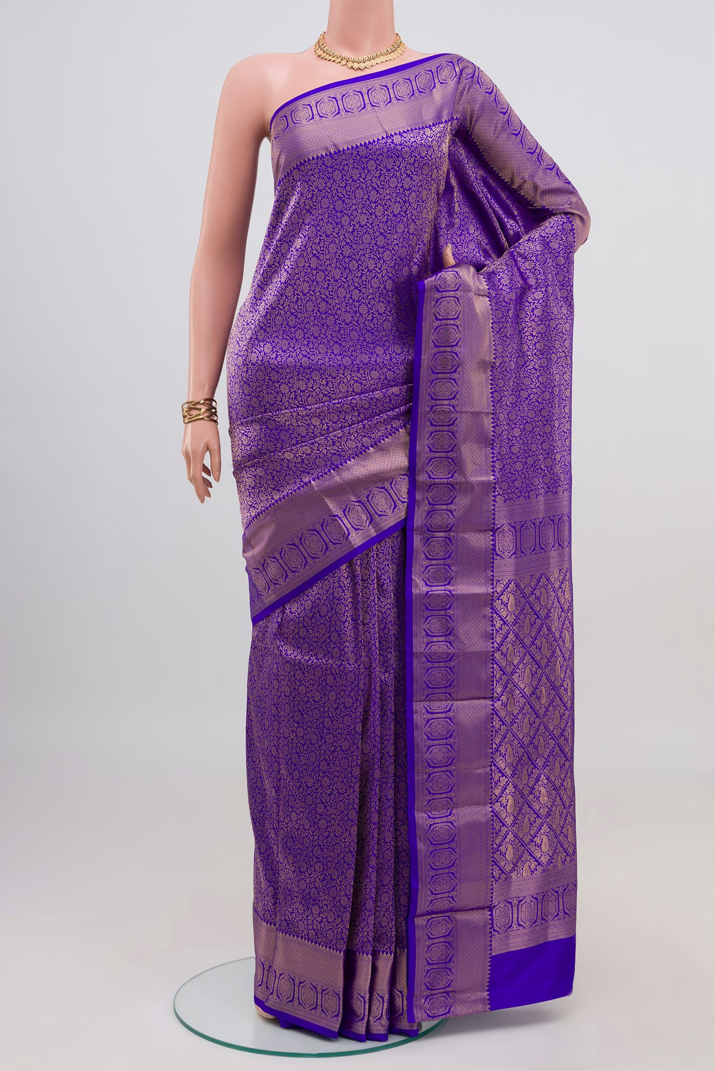 Blue Kanjivaram Silk Saree with Zari Brocade on the body and Zari Border.  displayed on a mannequin