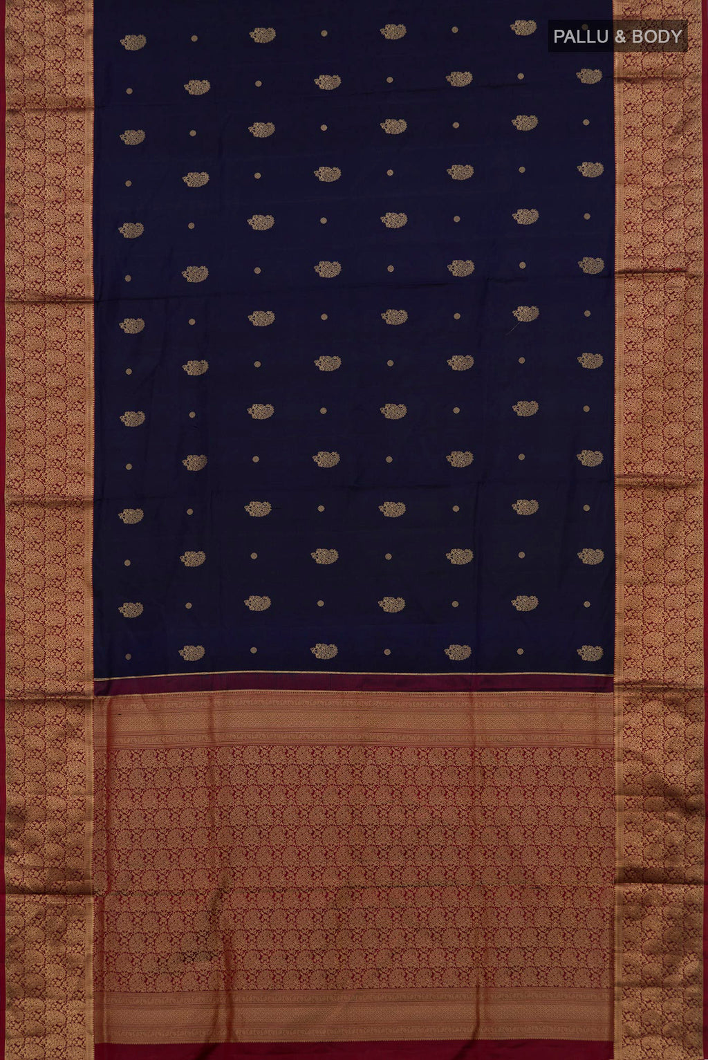 Flat view of Pure Silk Navy Blue Soft Saree with Zari Butta on the body and Zari Border. 