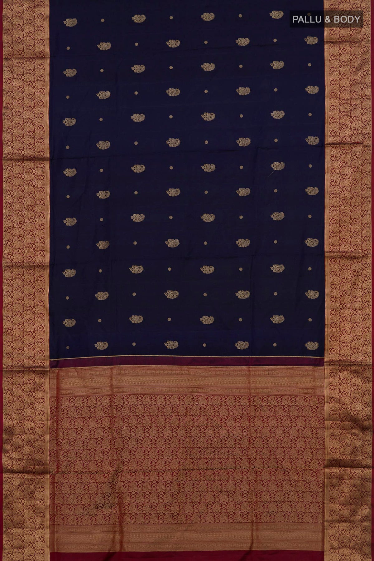 Flat view of Pure Silk Navy Blue Soft Saree with Zari Butta on the body and Zari Border. 