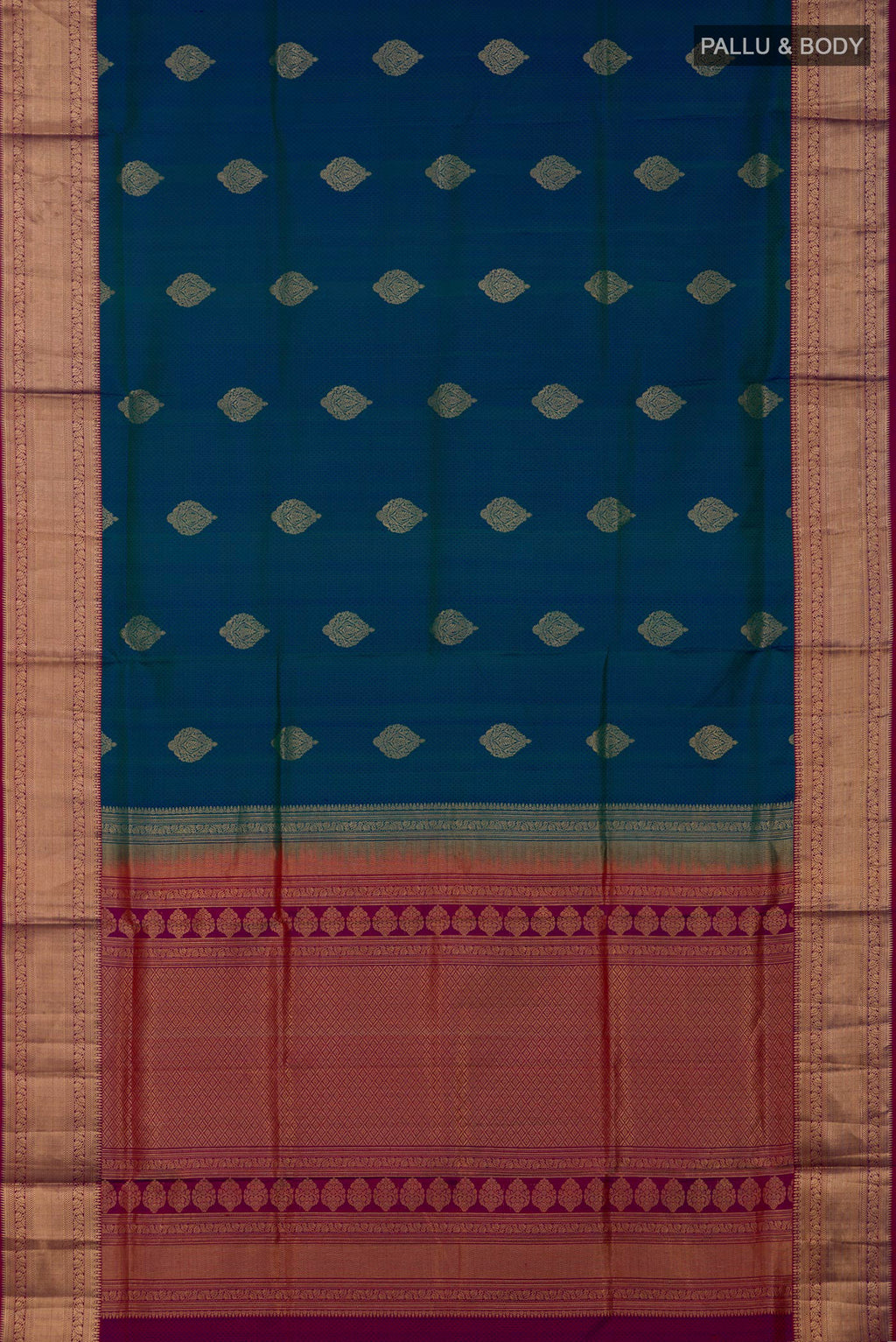 Flat view of Peacock Blue Soft Silk Saree with Jacquard With Zari Butta on the body and Zari Border. 