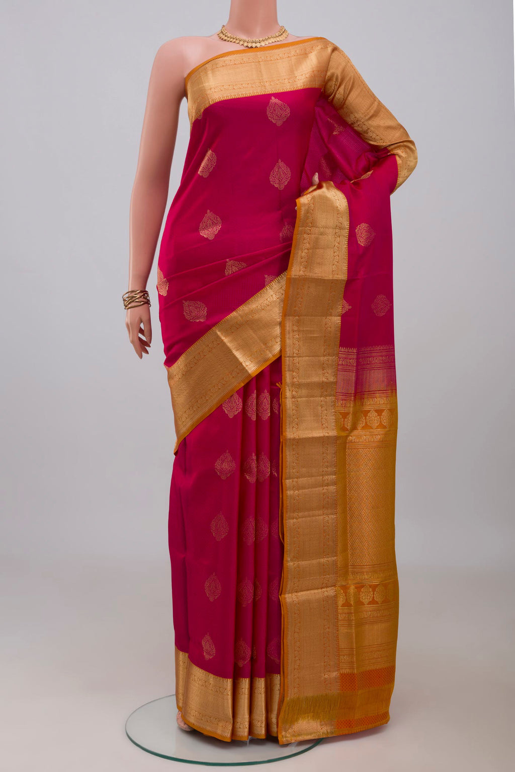 Pink Soft Silk Saree with Jacquard With Zari Butta on the body and Zari Border.  displayed on a mannequin