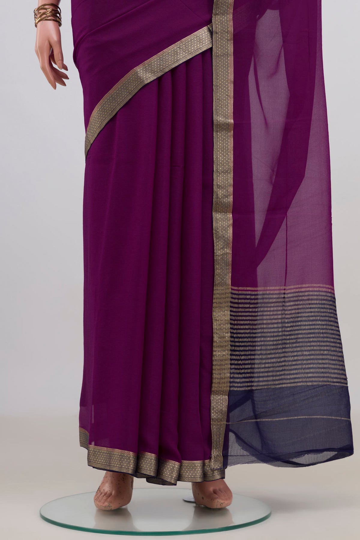 Pleats and pallu of Purple Mysore Chiffon Saree with Plain Body and Zari Border. 