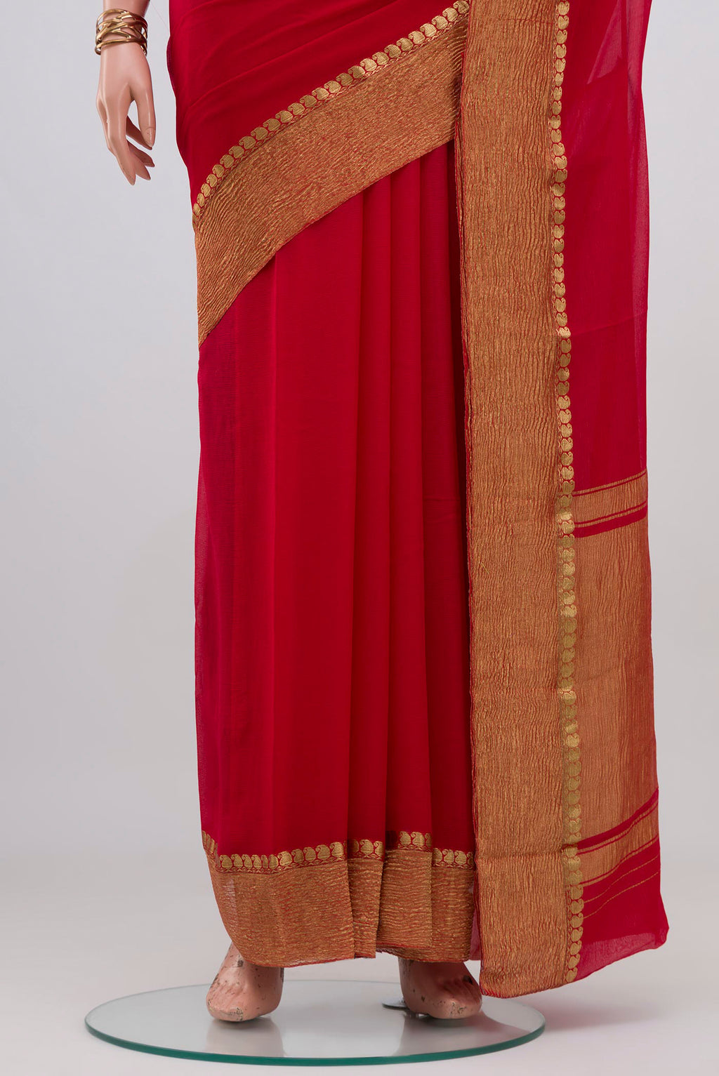 Pleats and pallu of Red Mysore Chiffon Saree with Plain Body and Crushed Broder. 