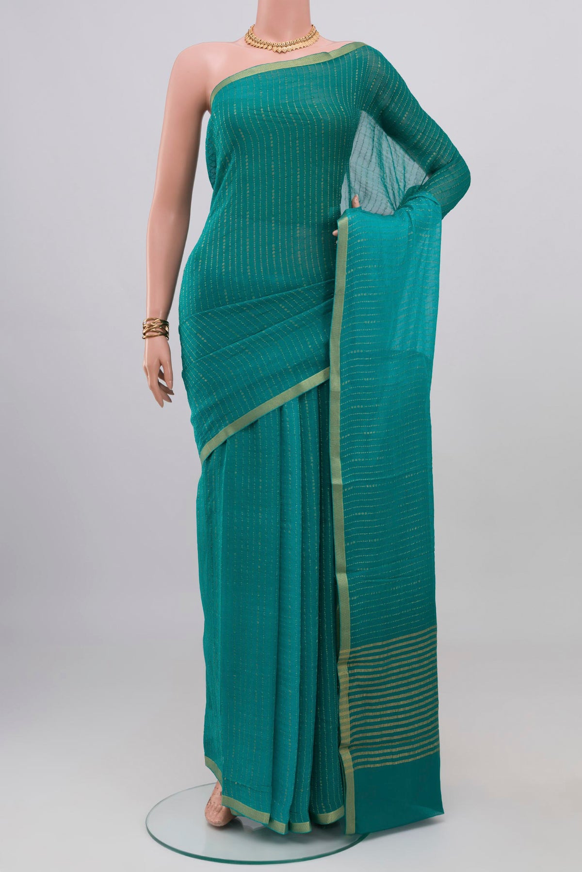Blue Mysore Georgette Saree with Stripes on the body and Zari Border.  displayed on a mannequin