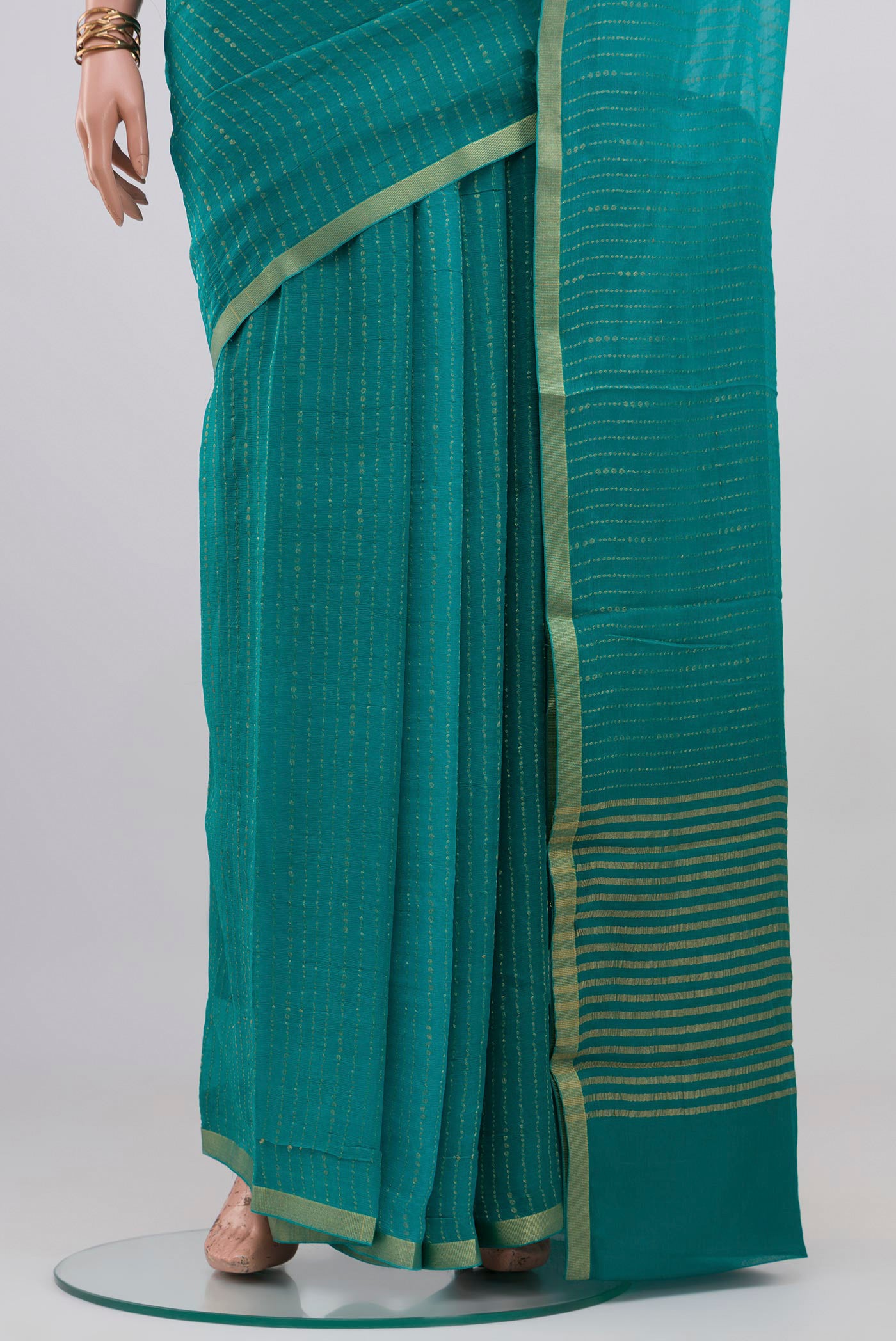 Pleats and pallu of Blue Mysore Georgette Saree with Stripes on the body and Zari Border. 