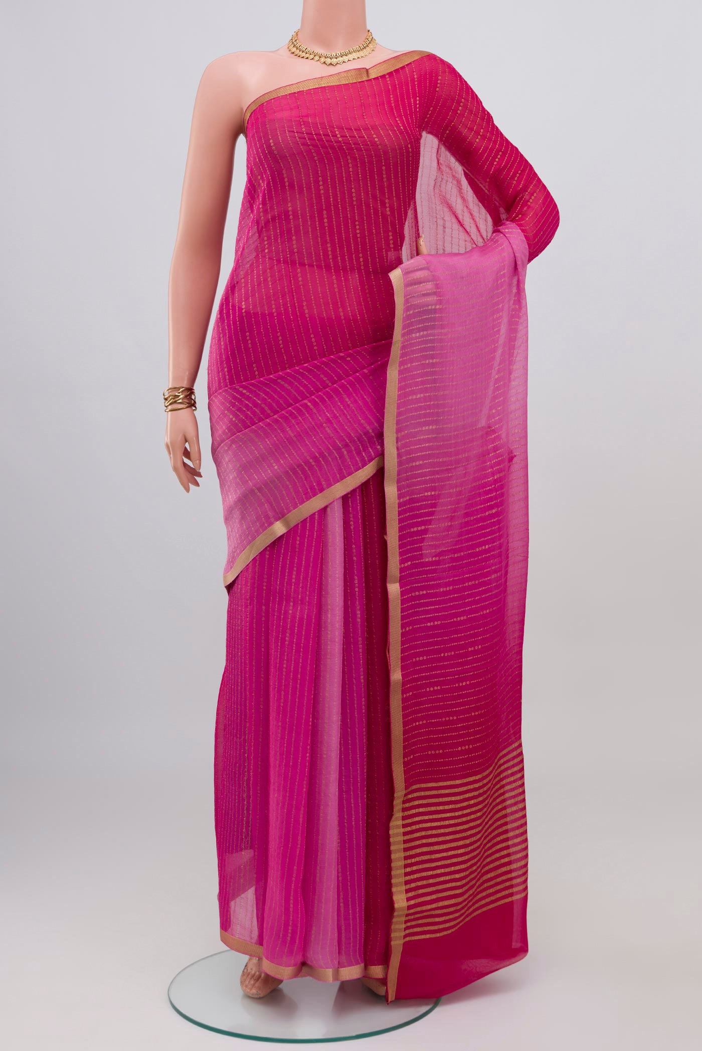 Multi Color Mysore Georgette Saree with Ombre design on the body and Zari Border.  displayed on a mannequin