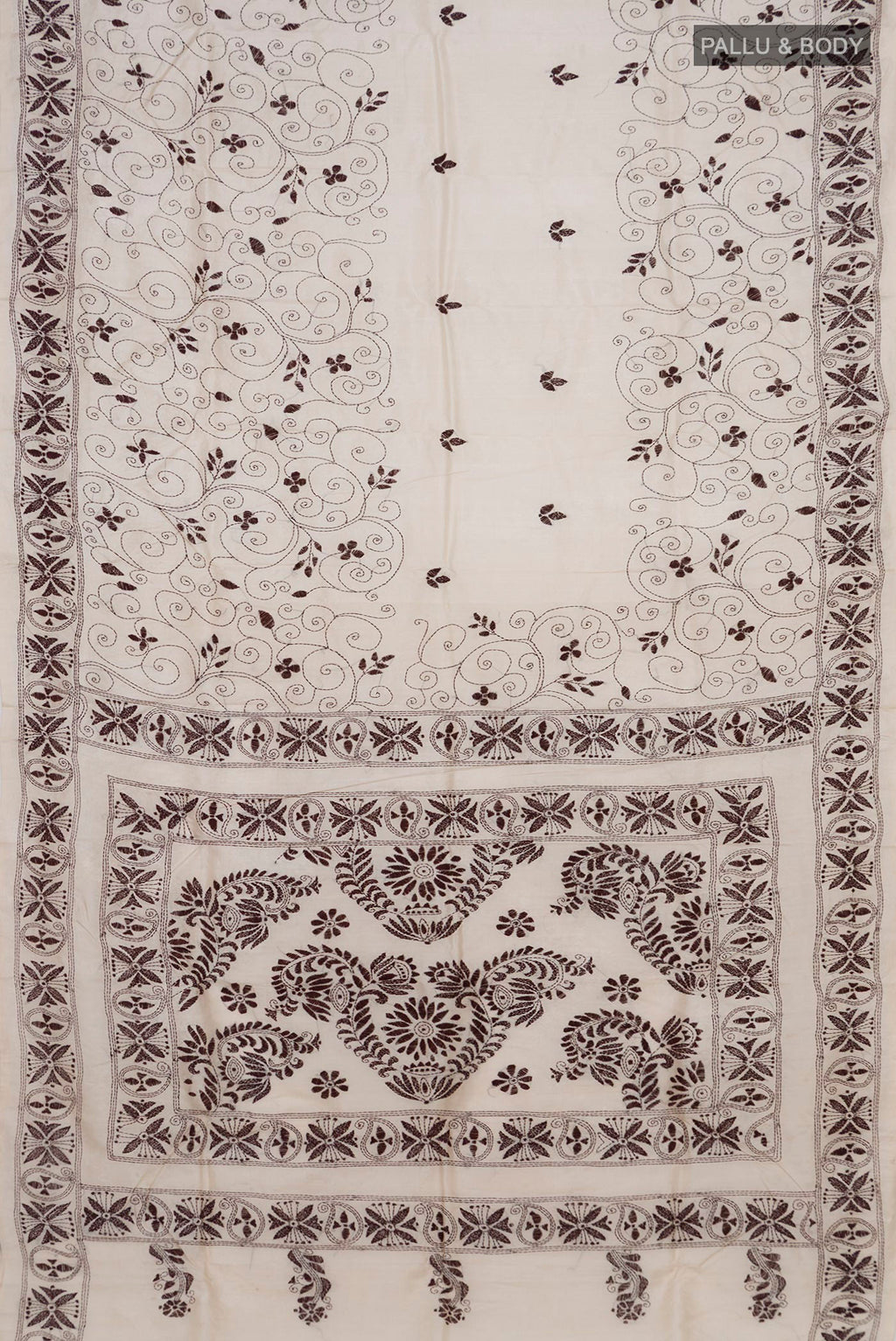 Flat view of Cream Tussar Saree with Kantha Work on the body and Thread Border. 