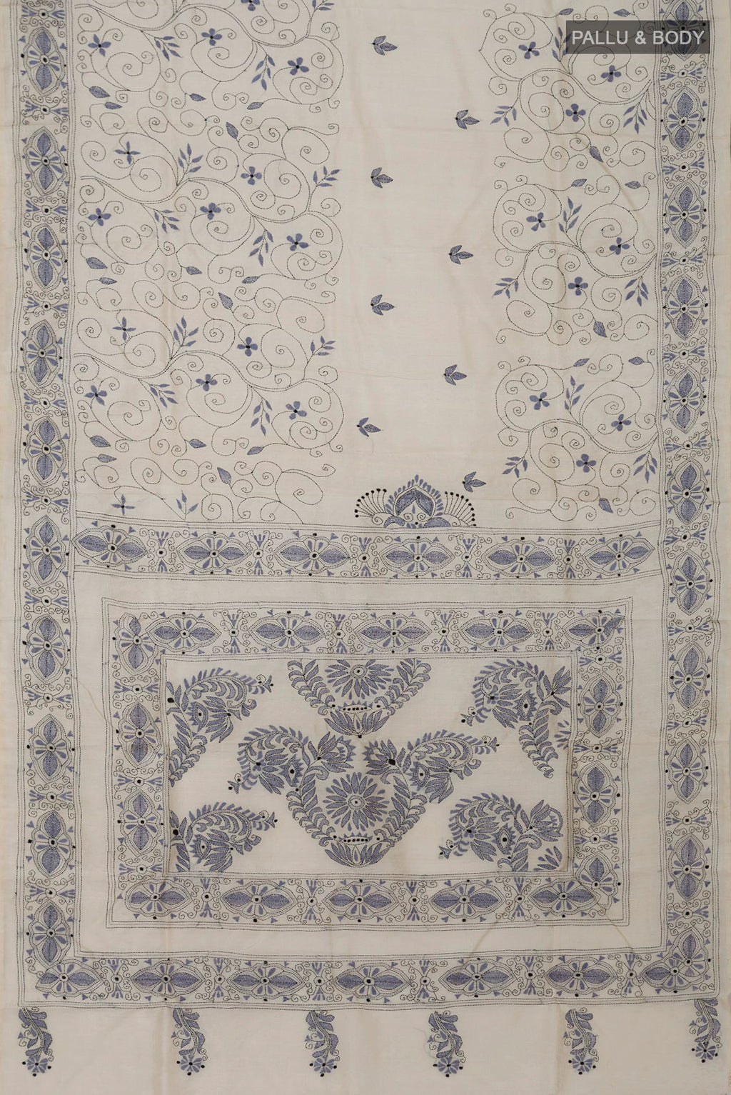 Flat view of Cream Tussar Silk Saree with Kantha Work on the body and Thread Border. 