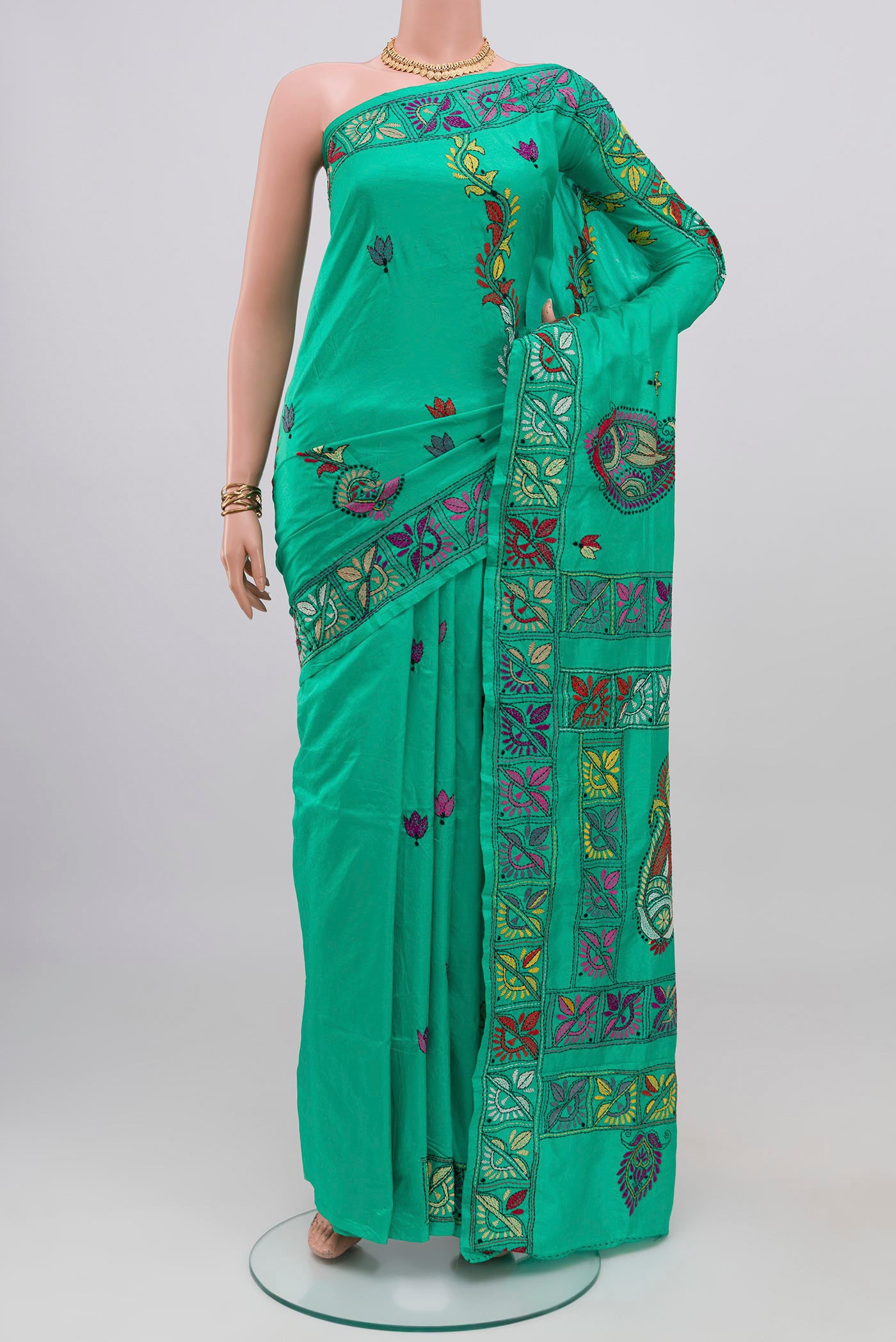 Sea Green Kantha Silk Saree with Kantha Work on the body and Thread Border.  displayed on a mannequin