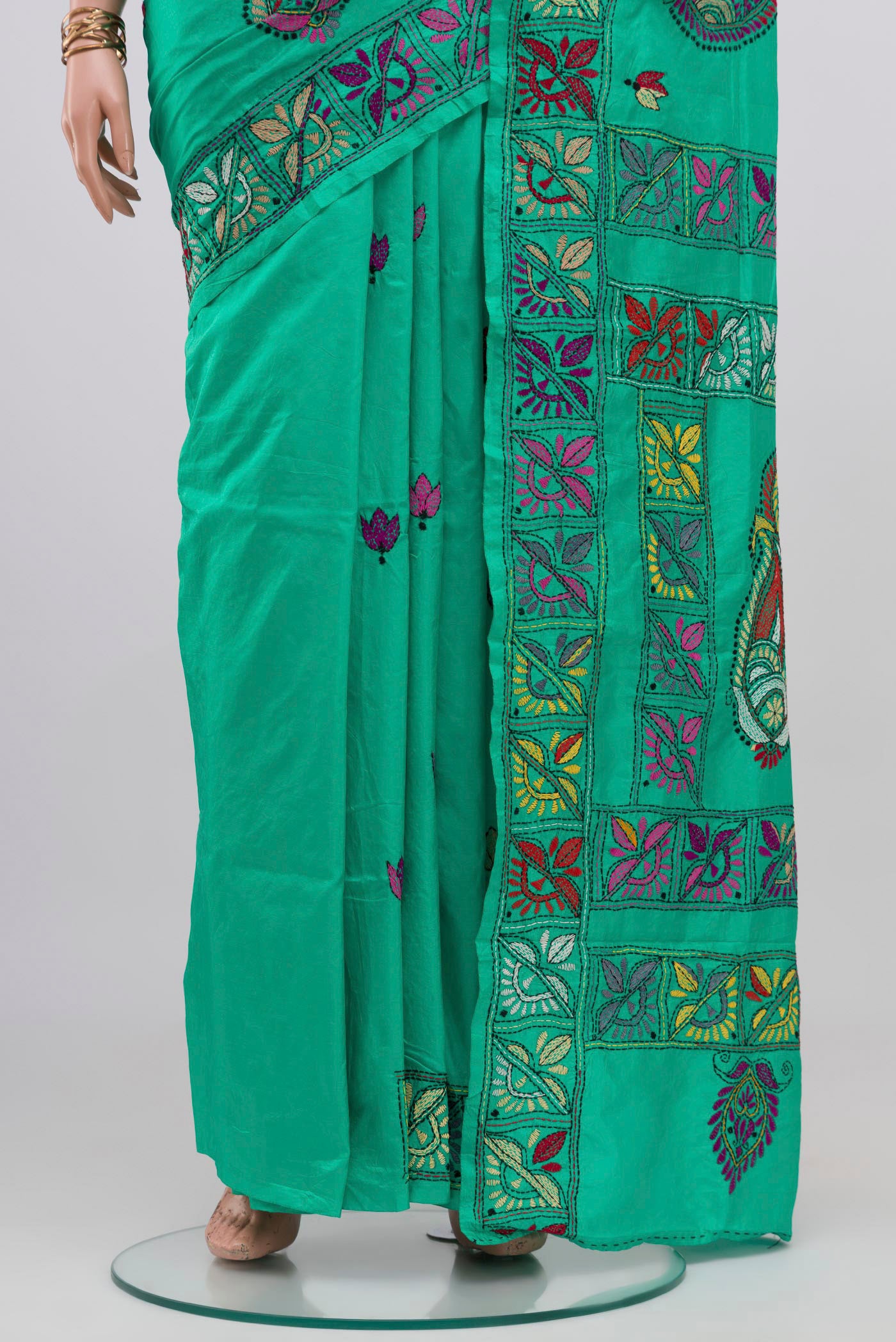 Pleats and pallu of Sea Green Kantha Silk Saree with Kantha Work on the body and Thread Border. 