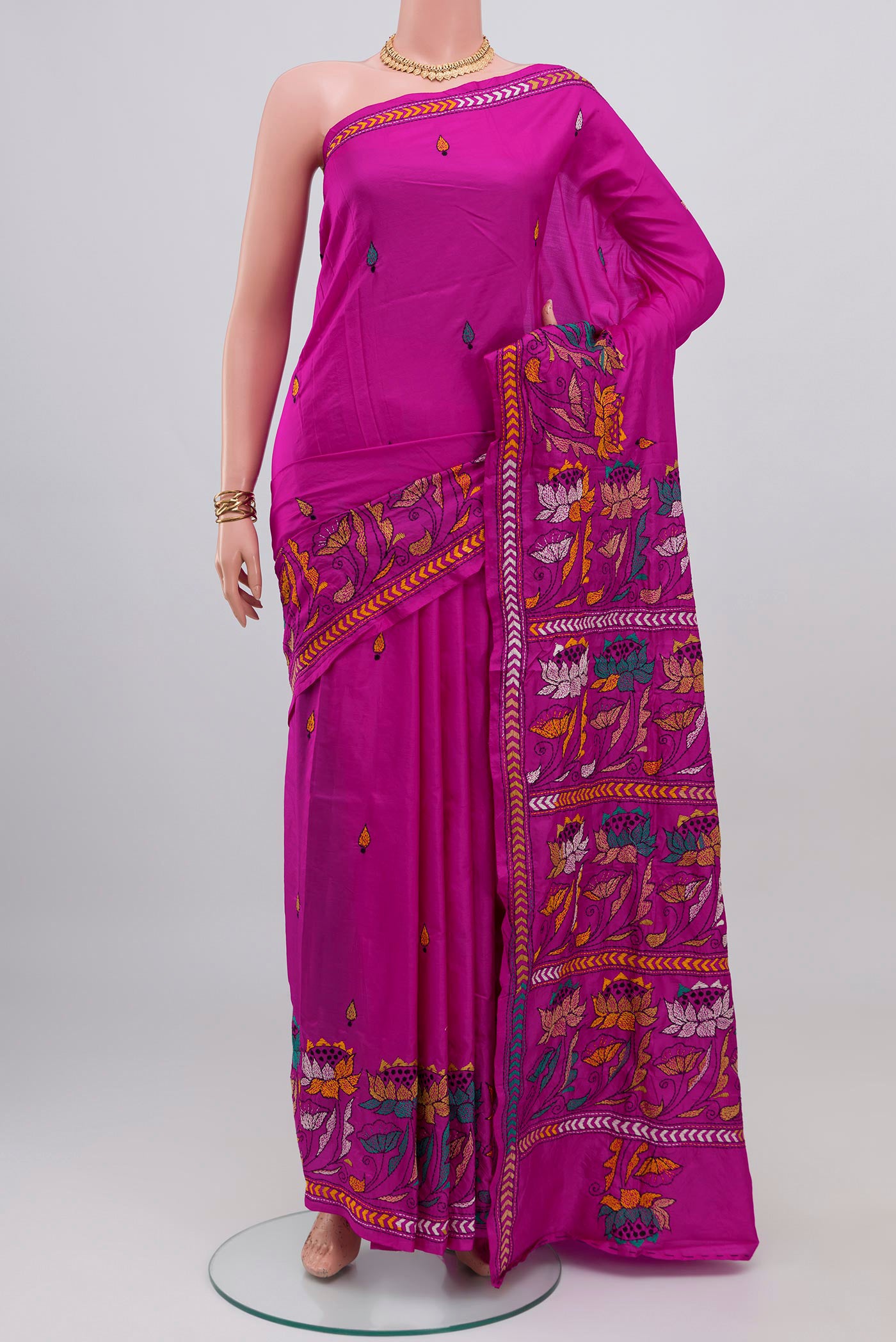 Rani Pink Kantha Silk Saree with Kantha Work on the body and Thread Border.  displayed on a mannequin