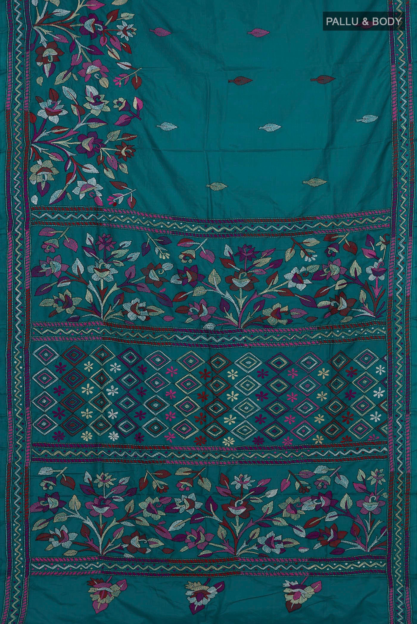 Flat view of Teal Kantha Silk Saree with Kantha Work on the body and Thread Border. 