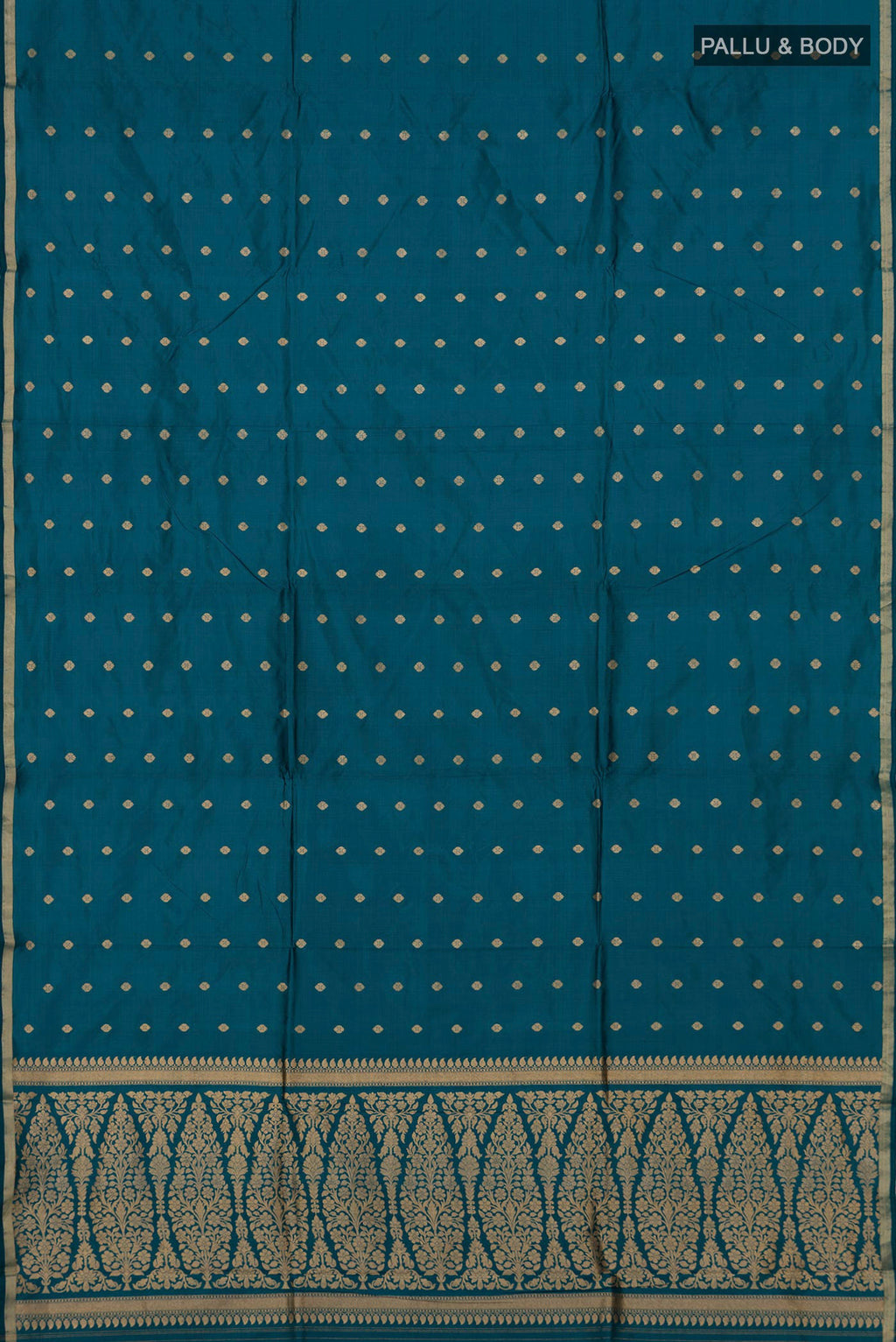 Flat view of Pure Silk Blue Banarasi Katan Saree with Zari Butta on the body and Thin Zari Line. 