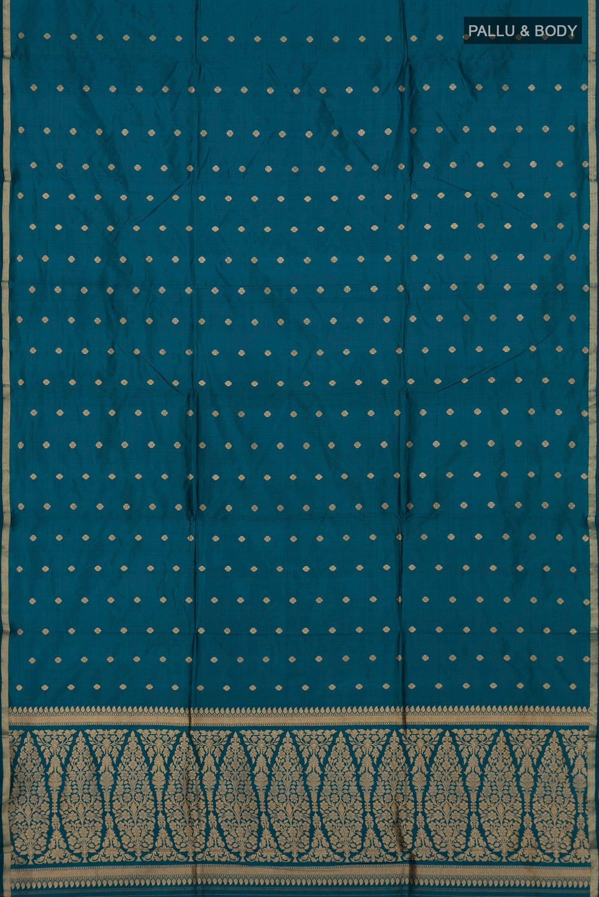 Flat view of Pure Silk Blue Banarasi Katan Saree with Zari Butta on the body and Thin Zari Line. 