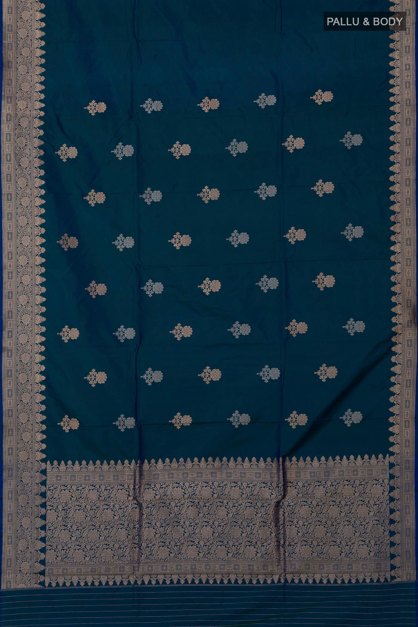 Flat view of Blue Banarasi Katan Silk Saree with Zari Butta on the body and Zari Border. 