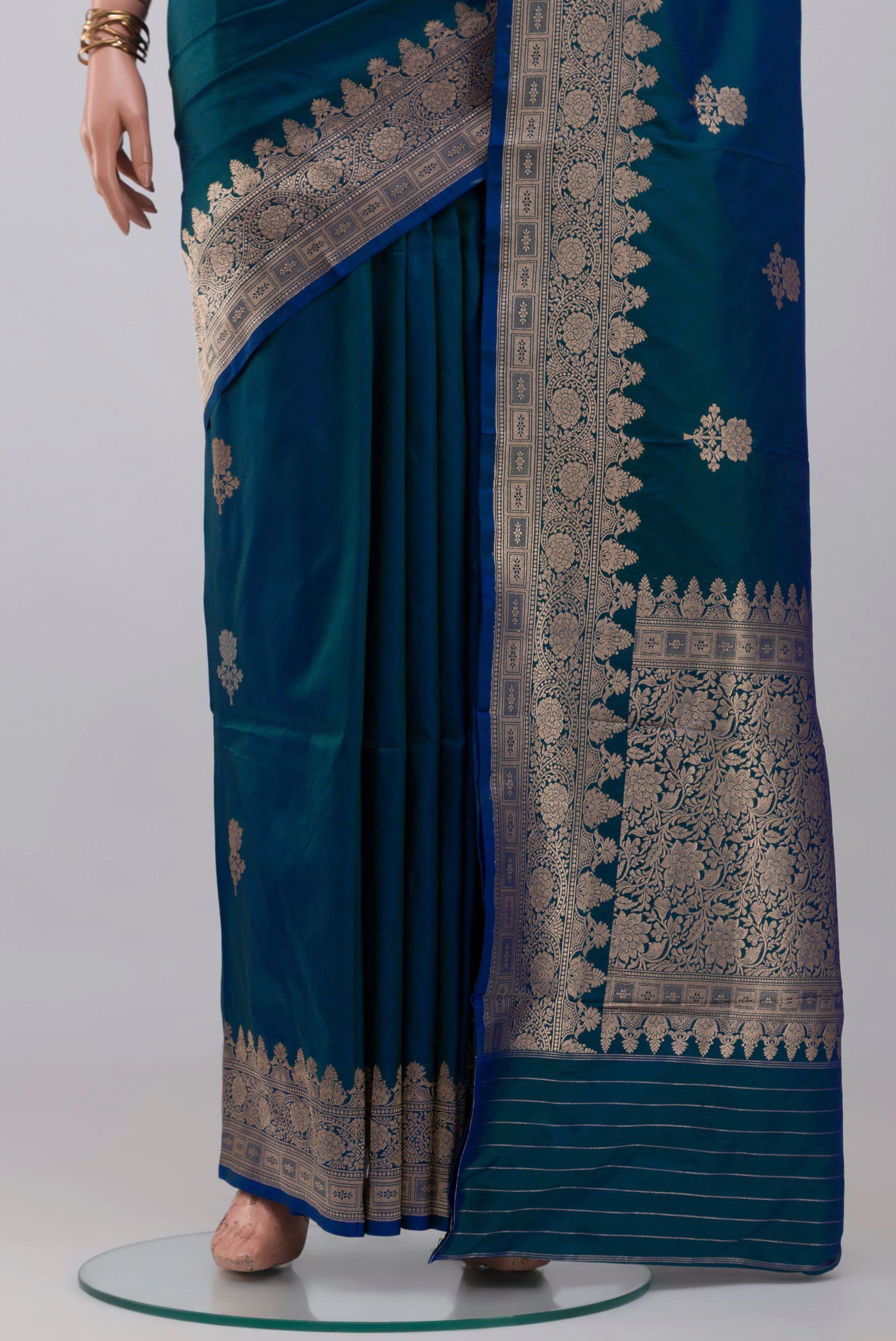 Pleats and pallu of Blue Banarasi Katan Silk Saree with Zari Butta on the body and Zari Border. 