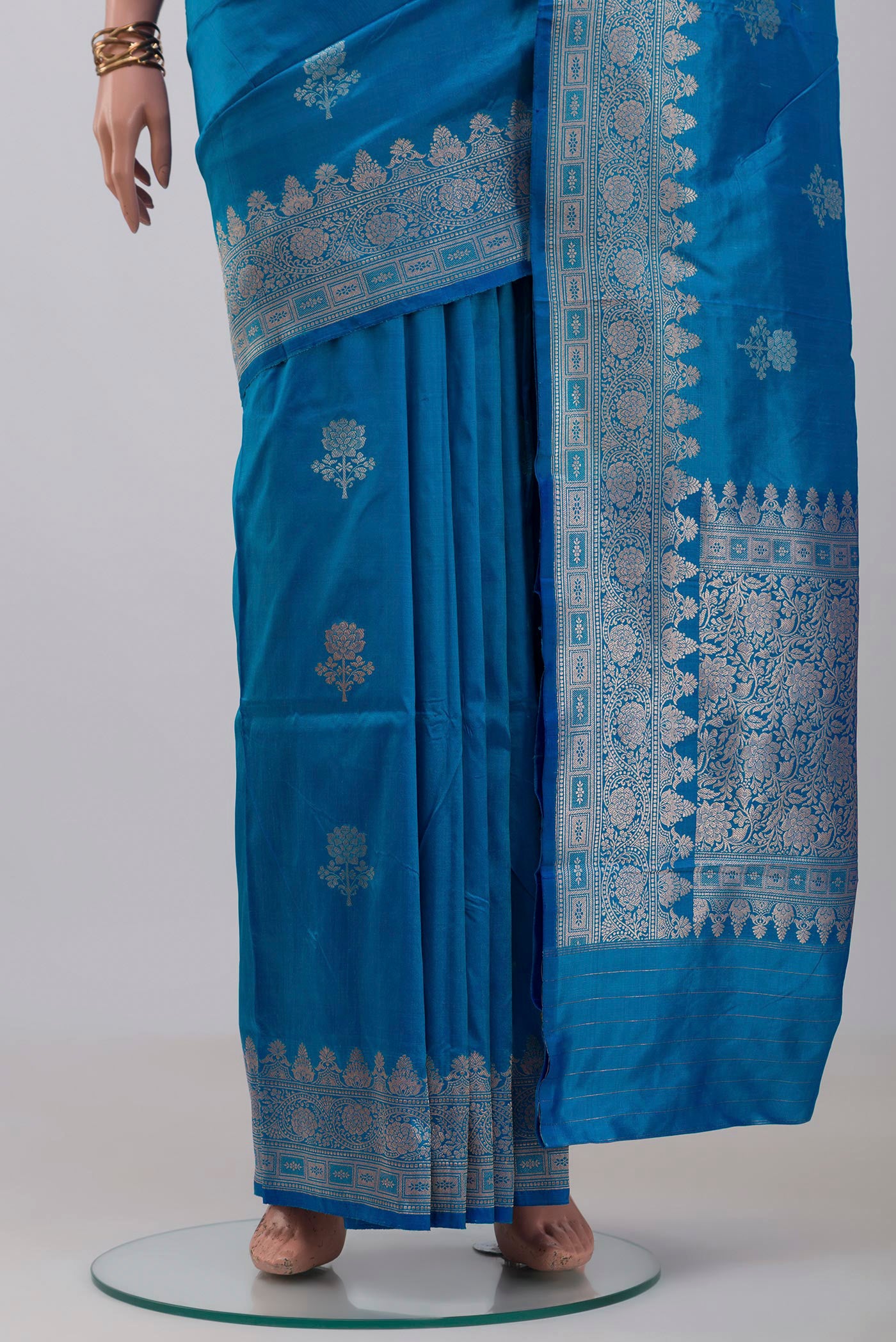 Pleats and pallu of Blue Banarasi Katan Silk Saree with Zari Butta on the body and Zari Border. 