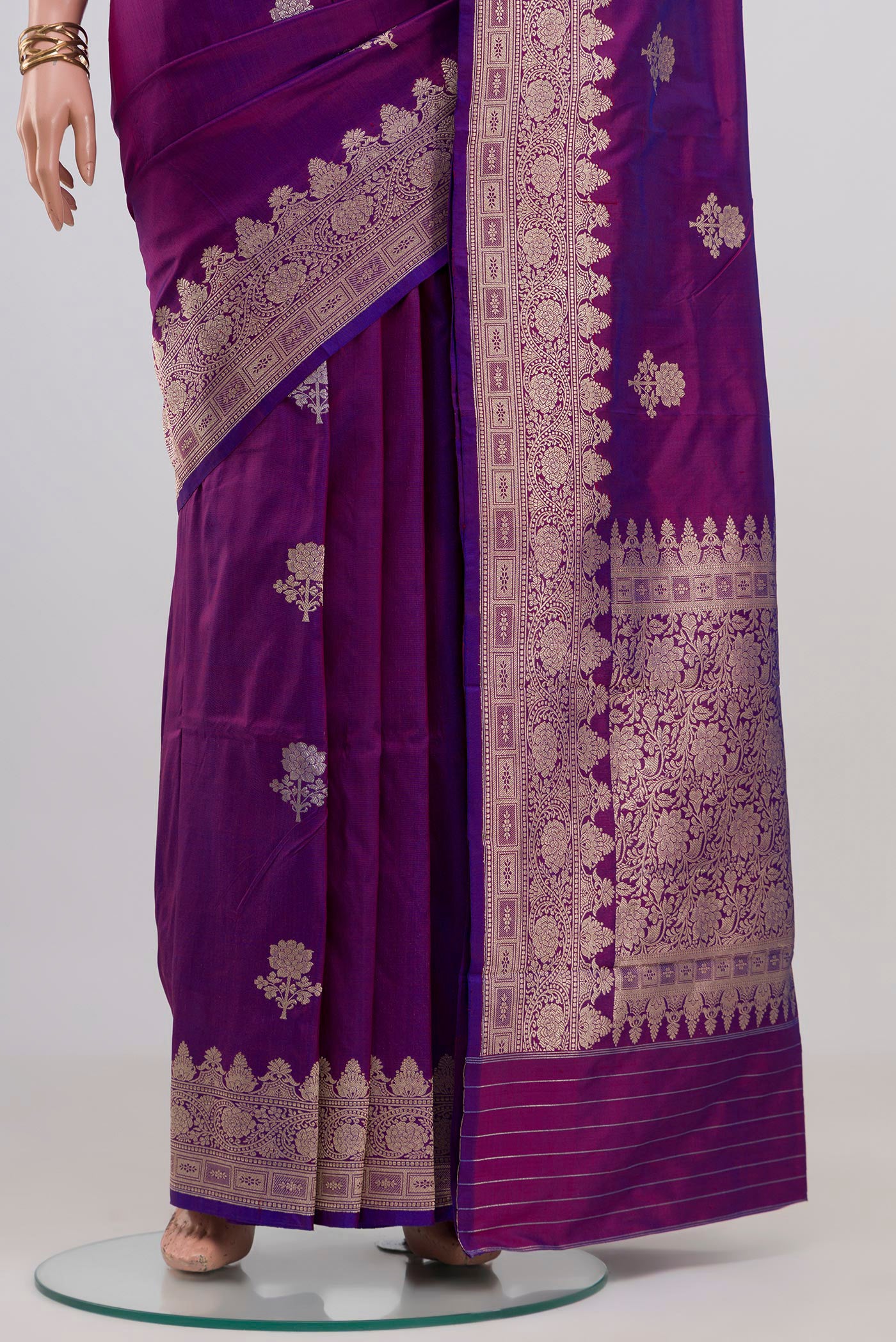 Pleats and pallu of Purple Banarasi Katan Silk Saree with Zari Butta on the body and Zari Border. 