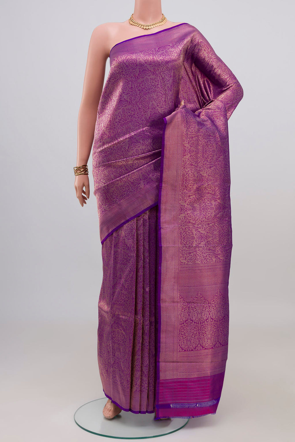 Purple Banarasi Katan Silk Saree with Zari Brocade on the body and Zari Border.  displayed on a mannequin