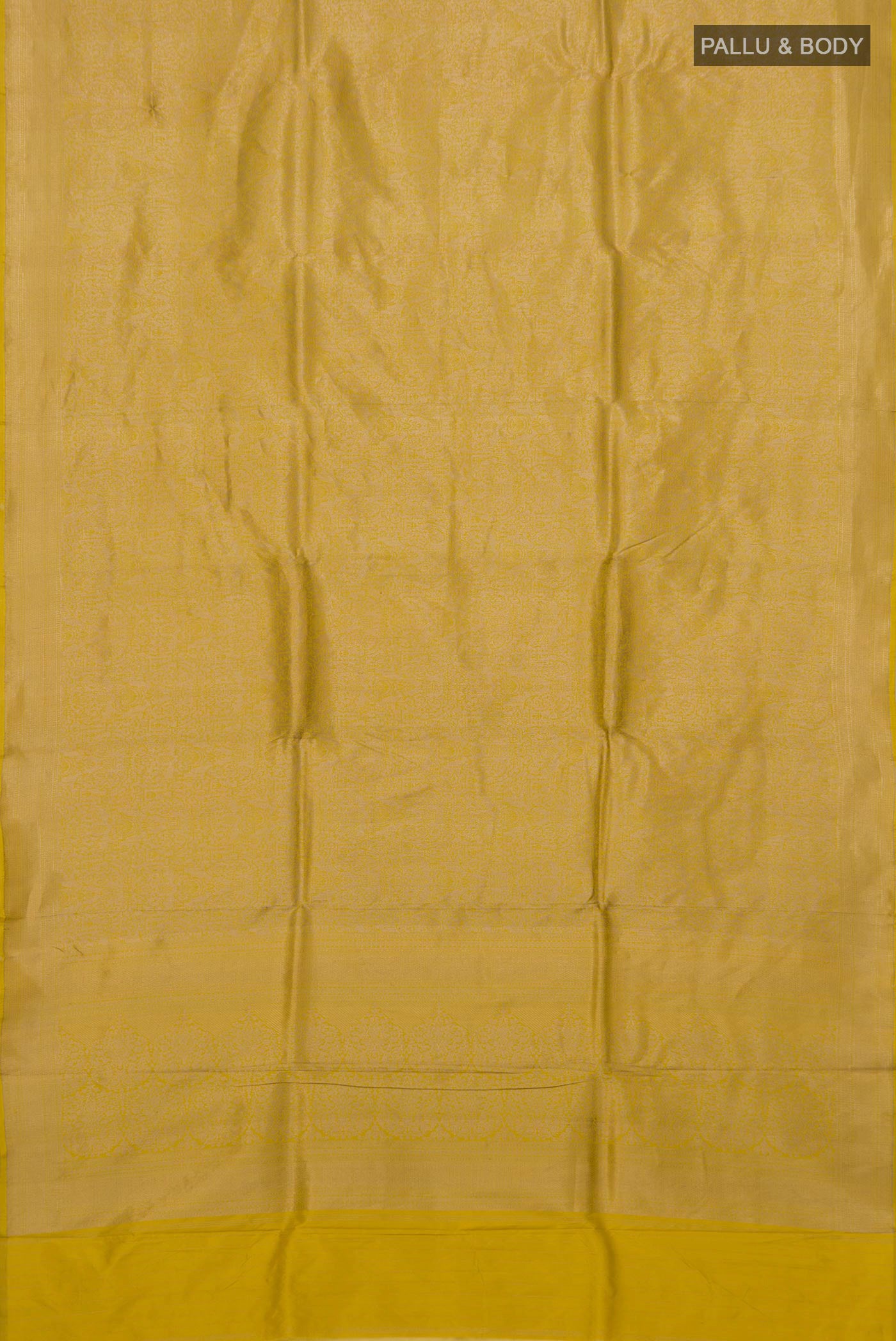 Flat view of Yellow Banarasi Katan Silk Saree with Zari Brocade on the body and Fancy Border. 