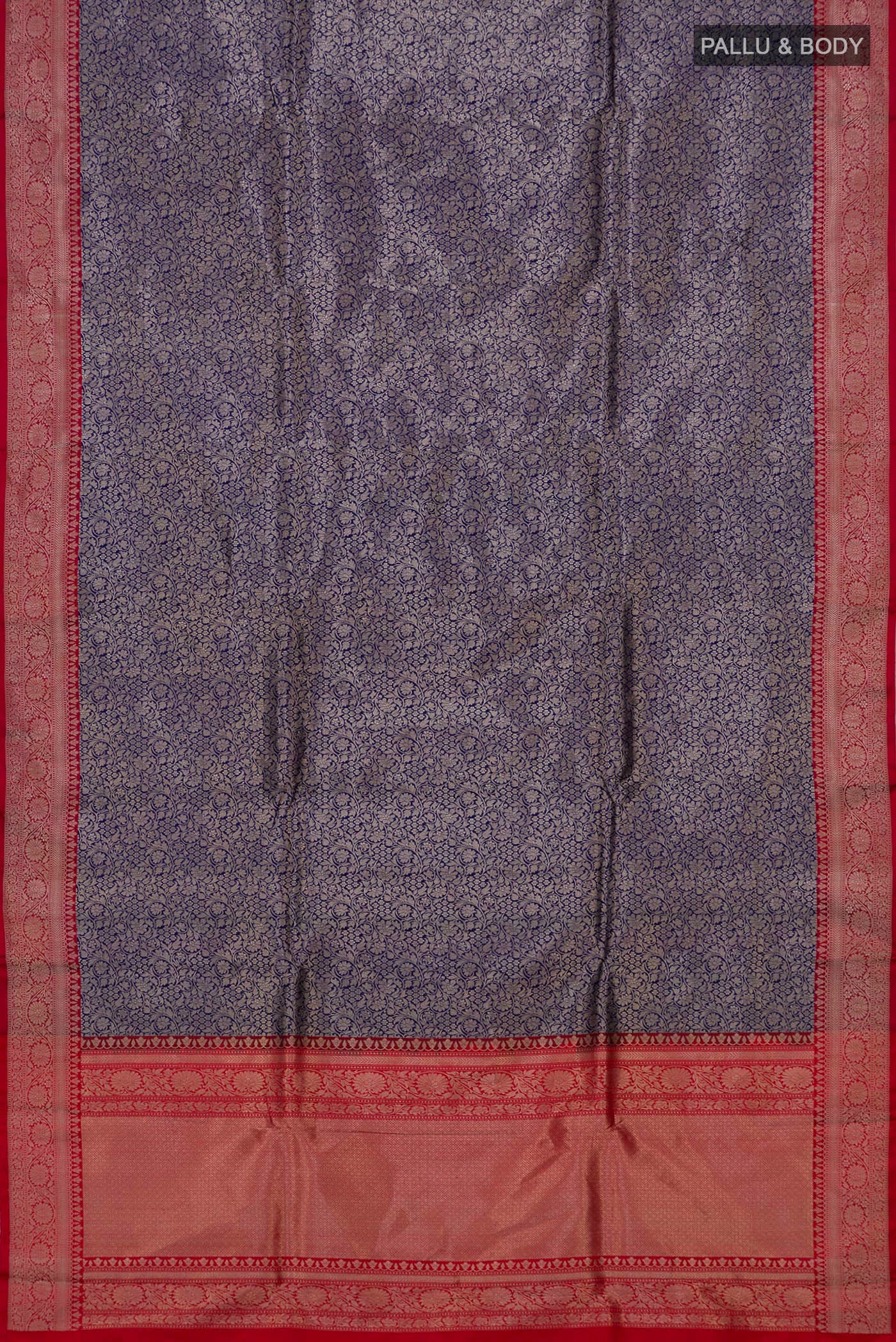Flat view of Navy Blue Banarasi Katan Silk Saree with Zari Brocade on the body and Zari Border. 